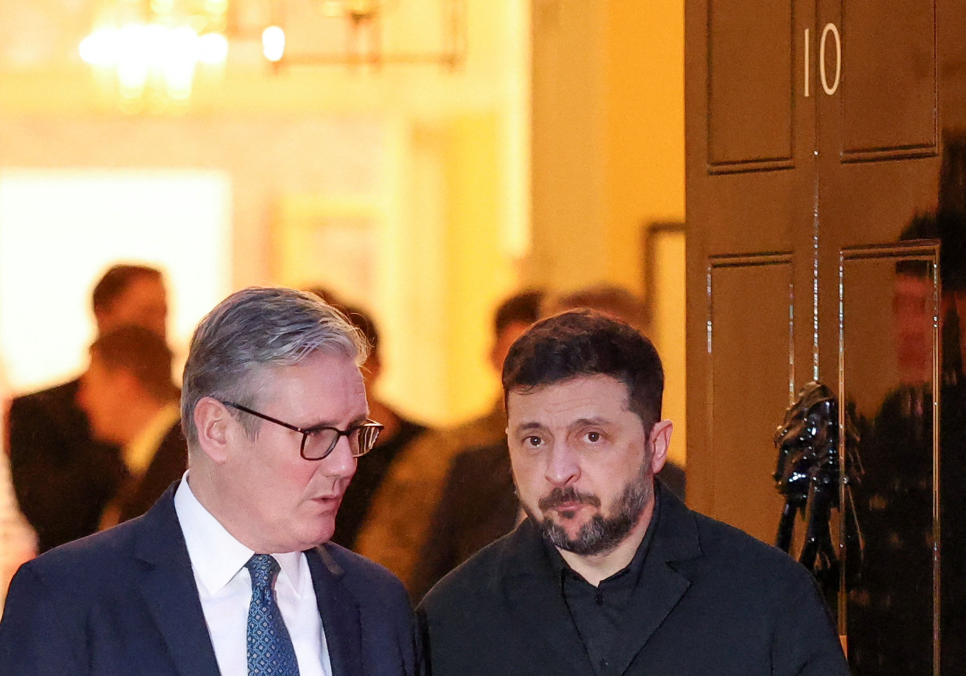 Ukrainian President Volodymyr Zelenskiy and British Prime Minister Keir Starmer step outside 10 Downing Street, in London, Britain