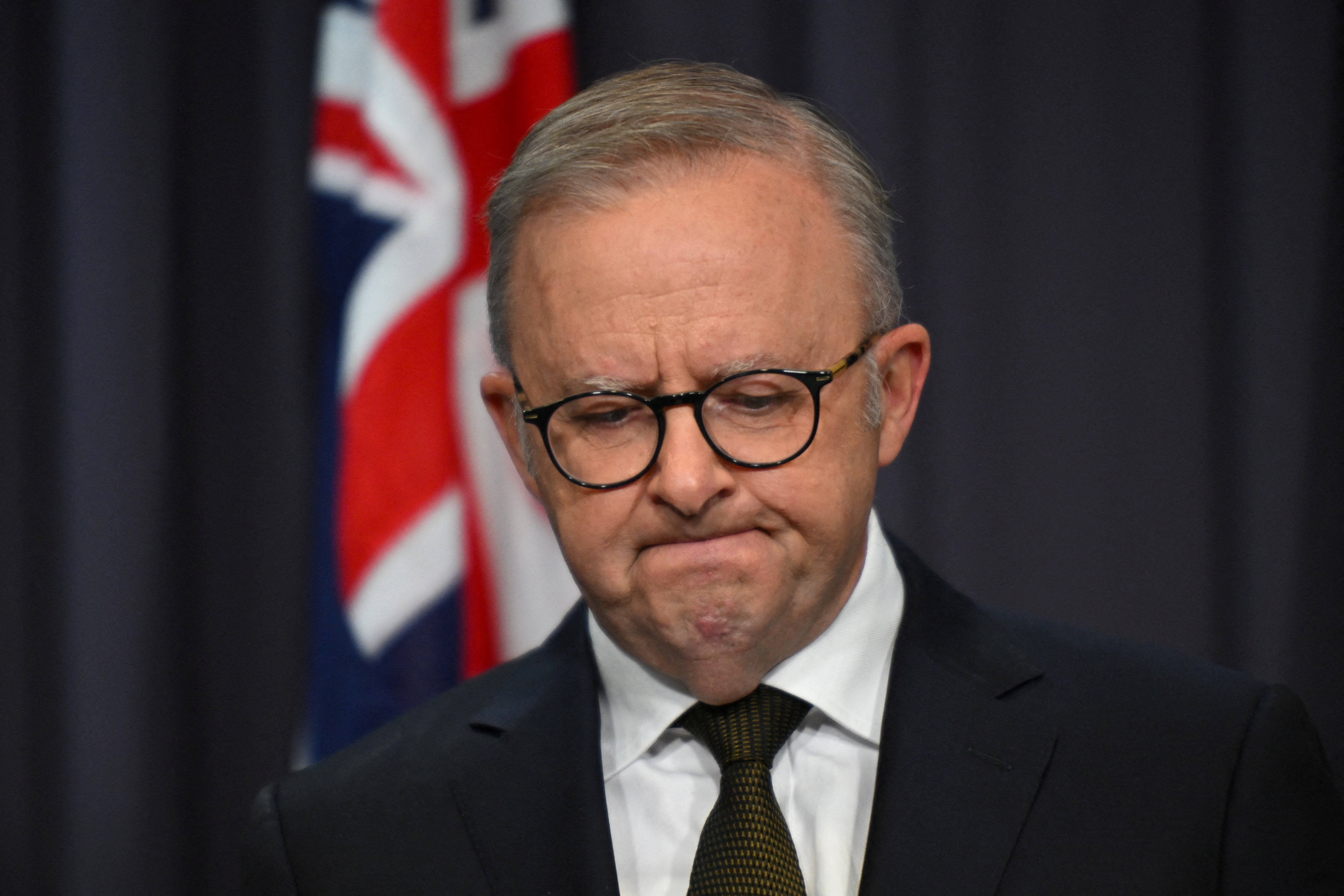 Australian Prime Minister Anthony Albanese reacts as he speaks to the media during a press conference following a shooting at Bondi Beach, at Parliament House in Canberra, Australia, December 14, 2025.