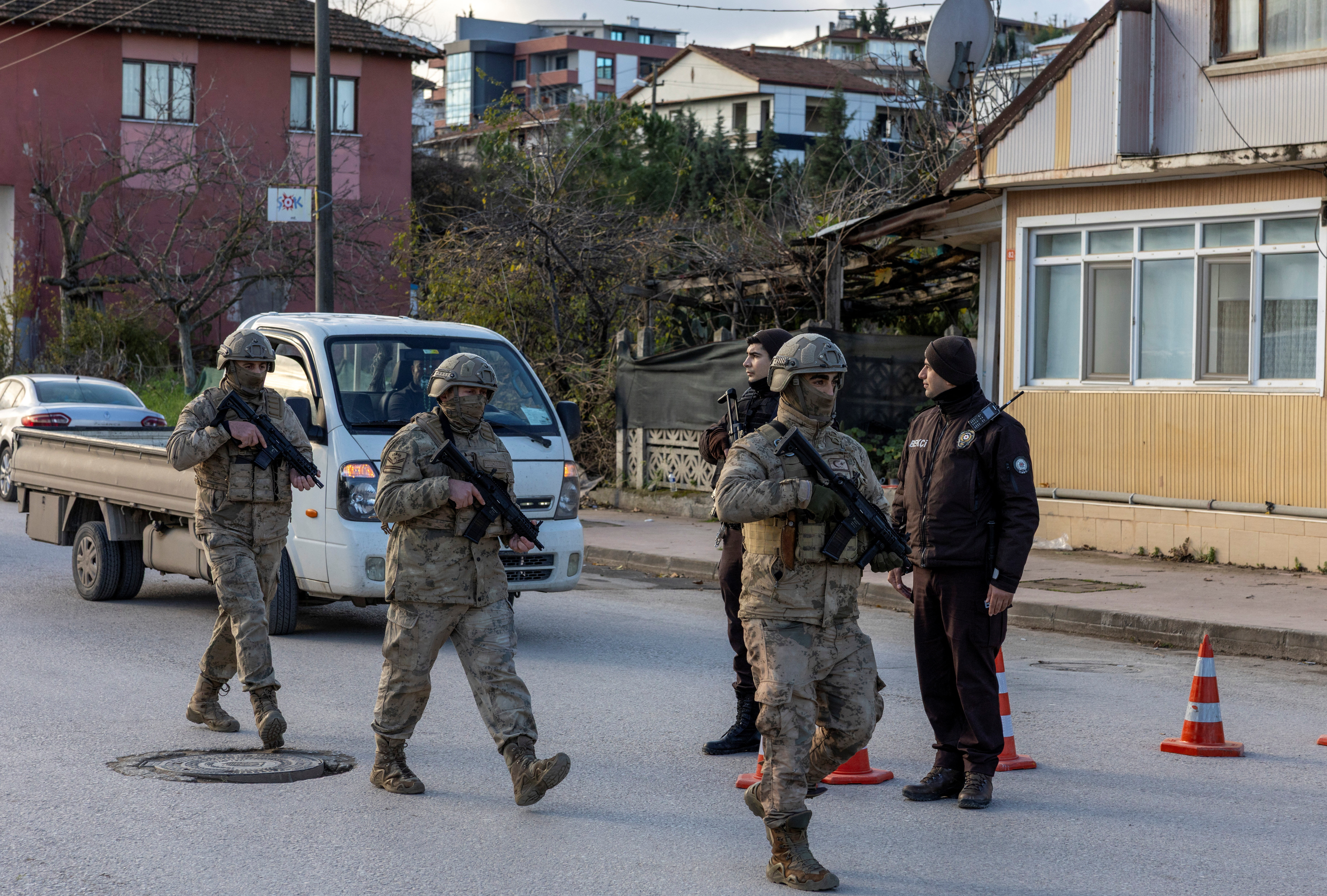 Turkish gendarmerie special forces team leaves the site where Turkish security forces launched an operation on a house believed to contain suspected Islamic State militants