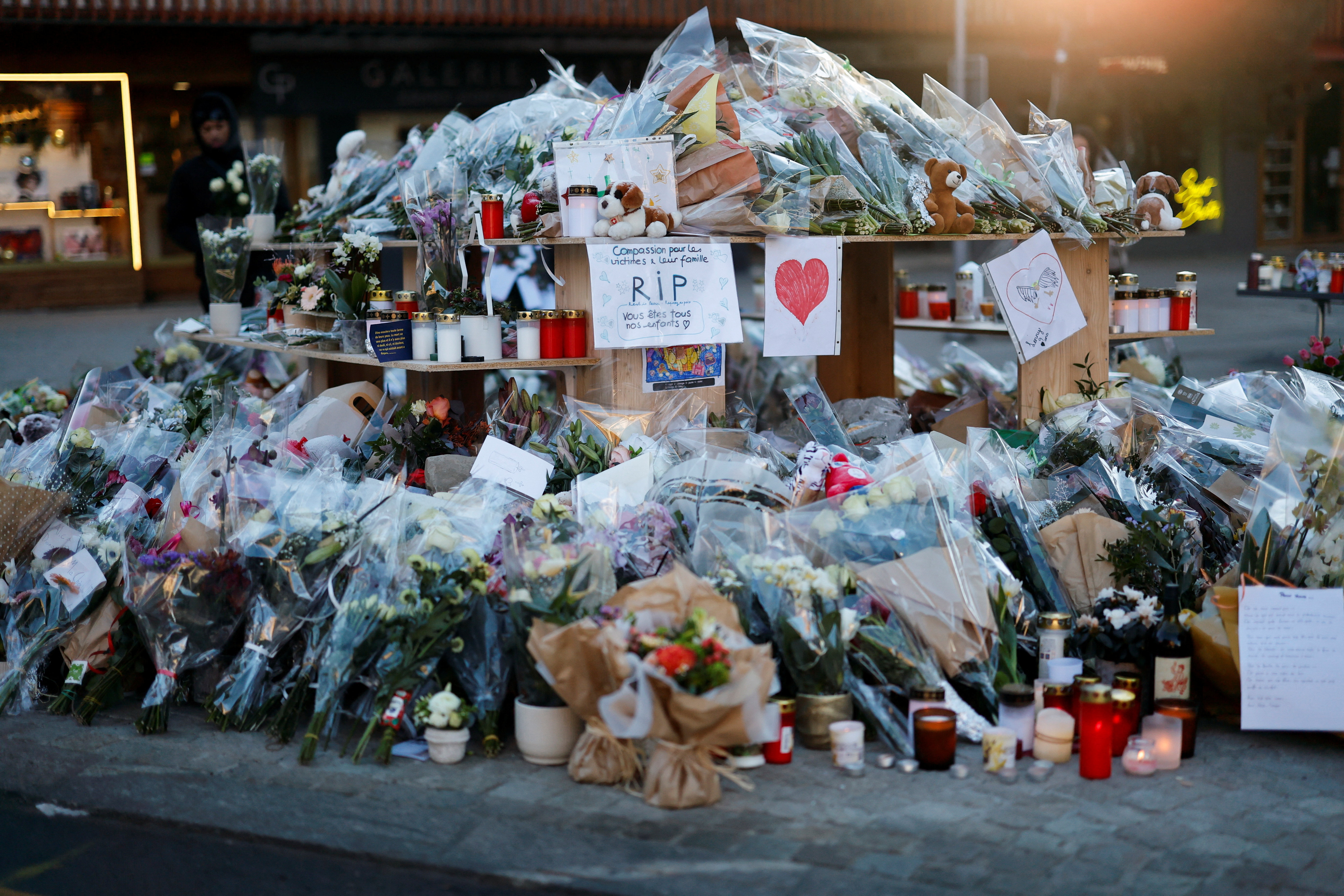 Tributes lie near the "Le Constellation" bar, after a deadly fire and explosion during a New Year's Eve party, in the upscale ski resort of Crans-Montana, in southwestern Switzerland, January 4, 2026. REUTERS/Lisa Leutner