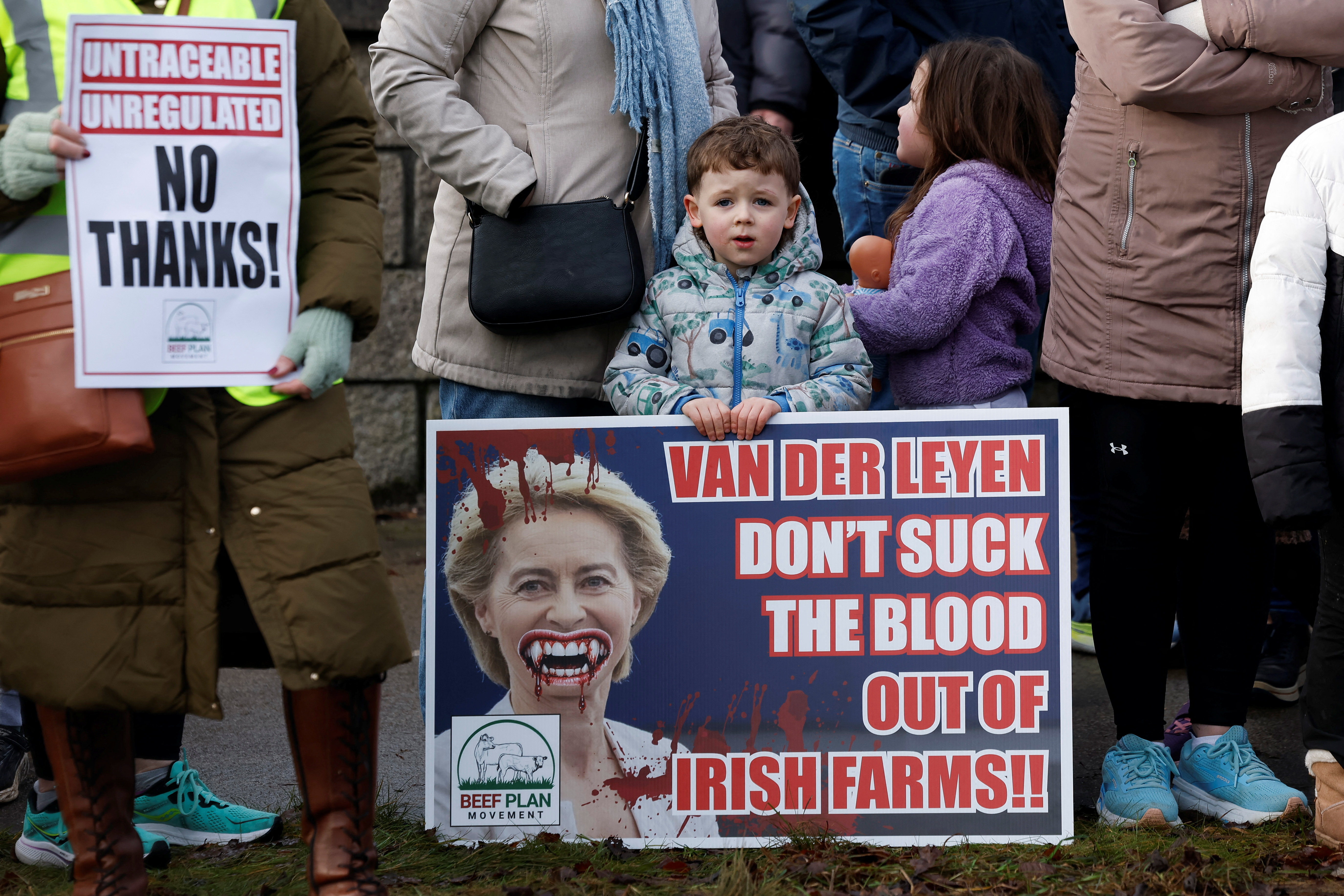 A child holds a sign during a farmers' protest against the EU-Mercosur free trade agreement, in Athlone, Ireland, January 10, 2026.