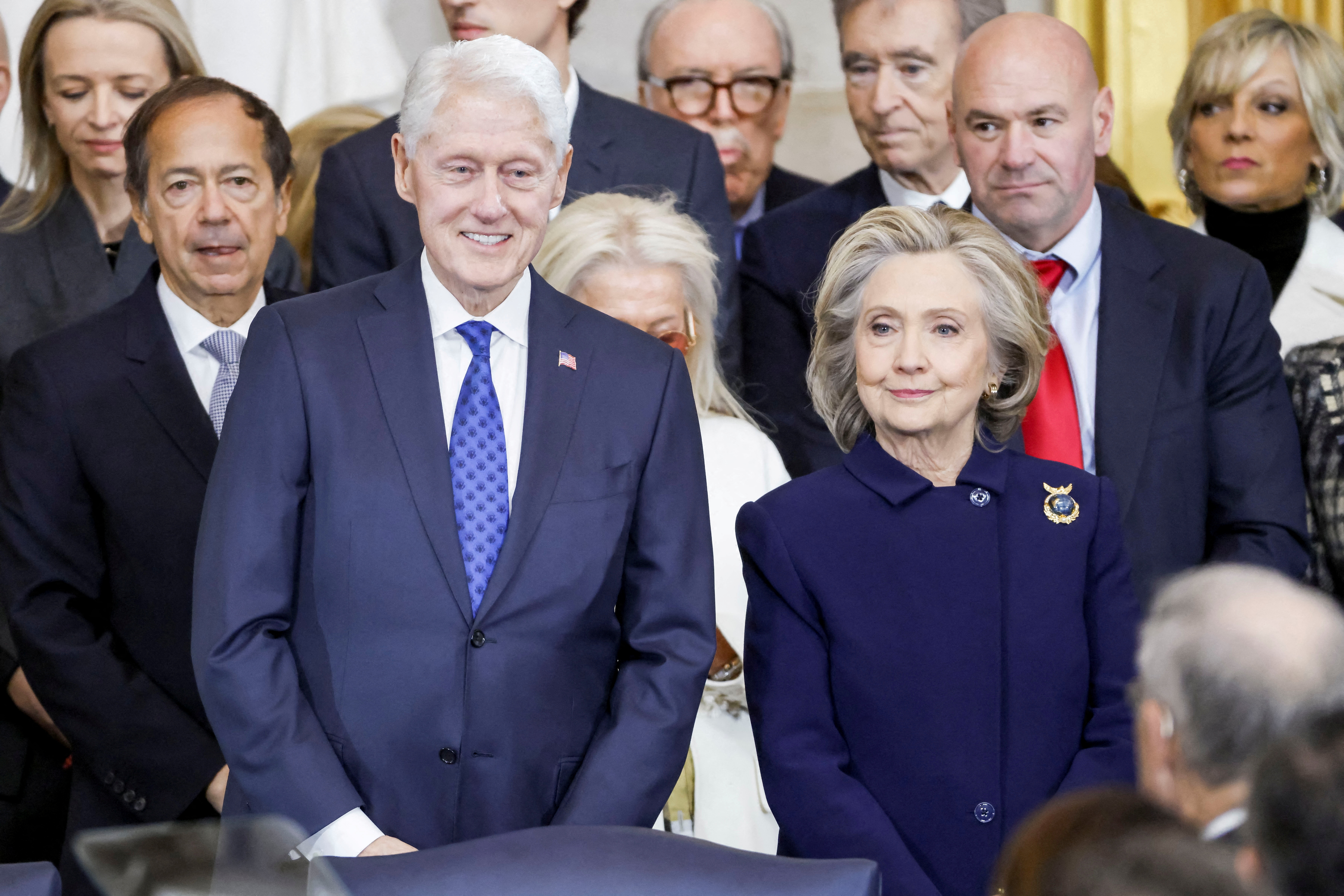 Former U.S. President Bill Clinton and former U.S. Secretary of State Hillary Clinton arrive for Donald Trump's inauguration as the next President of the United States in the Rotunda of the United States Capitol in Washington, U.S., January 20, 2025.