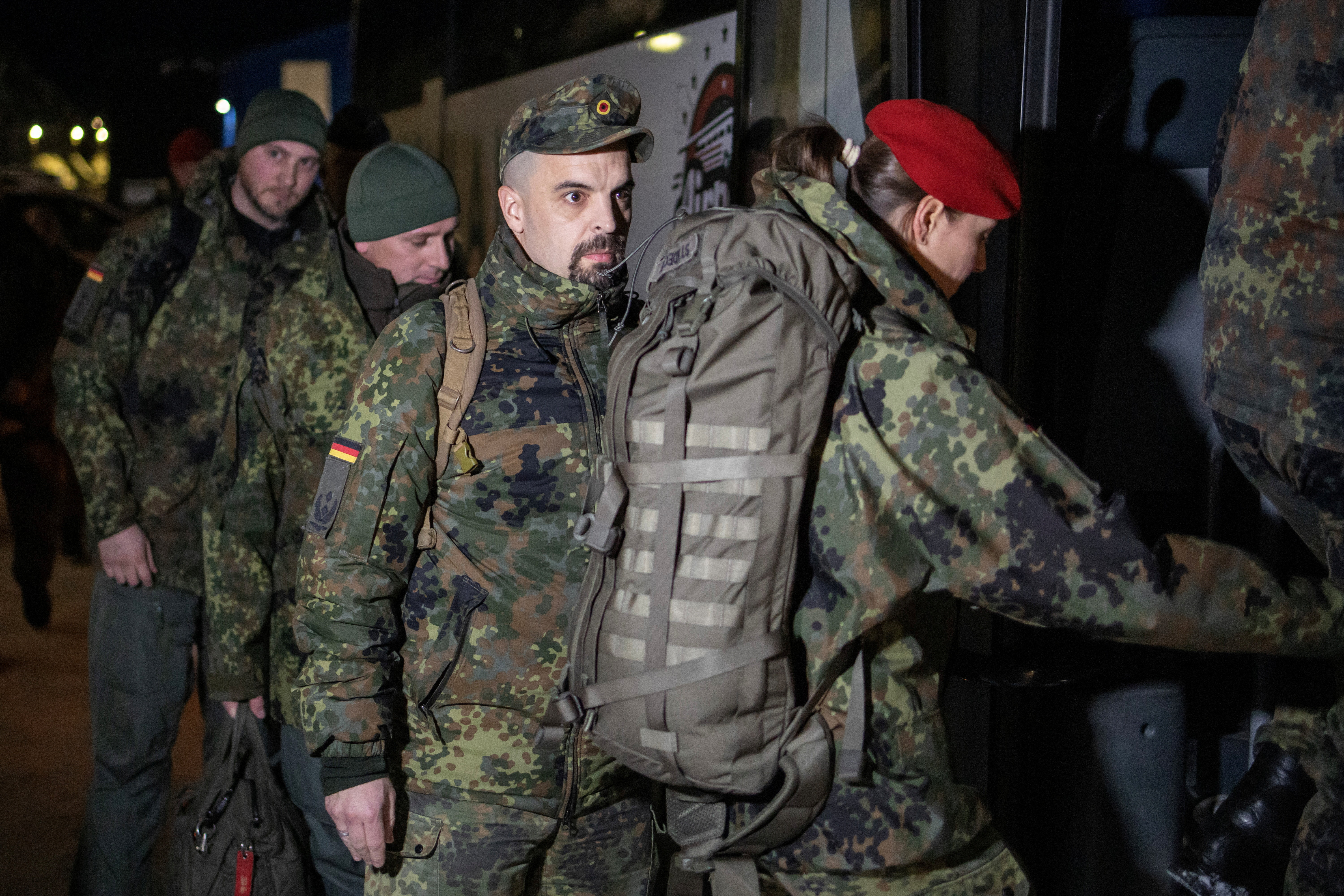 Soldiers from the German Armed Forces board a bus upon their arrival in Nuuk, Greenland, January 16, 2026.