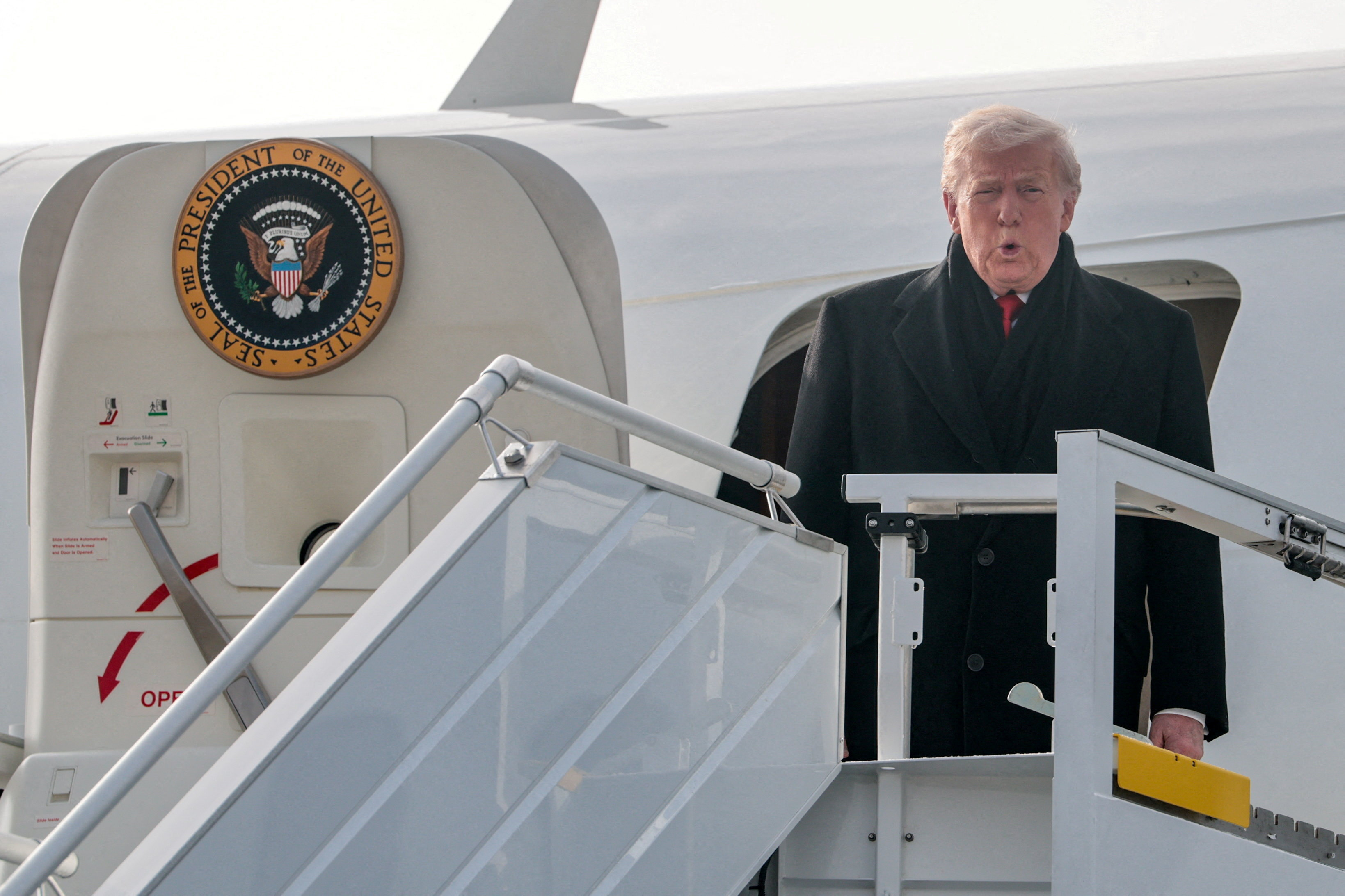 U.S. President Donald Trump disembarks Air Force One en route to the World Economic Forum in Davos, at Zurich International Airport in Zurich, Switzerland January 21, 2026. REUTERS/Jonathan Ernst       TPX IMAGES OF THE DAY
