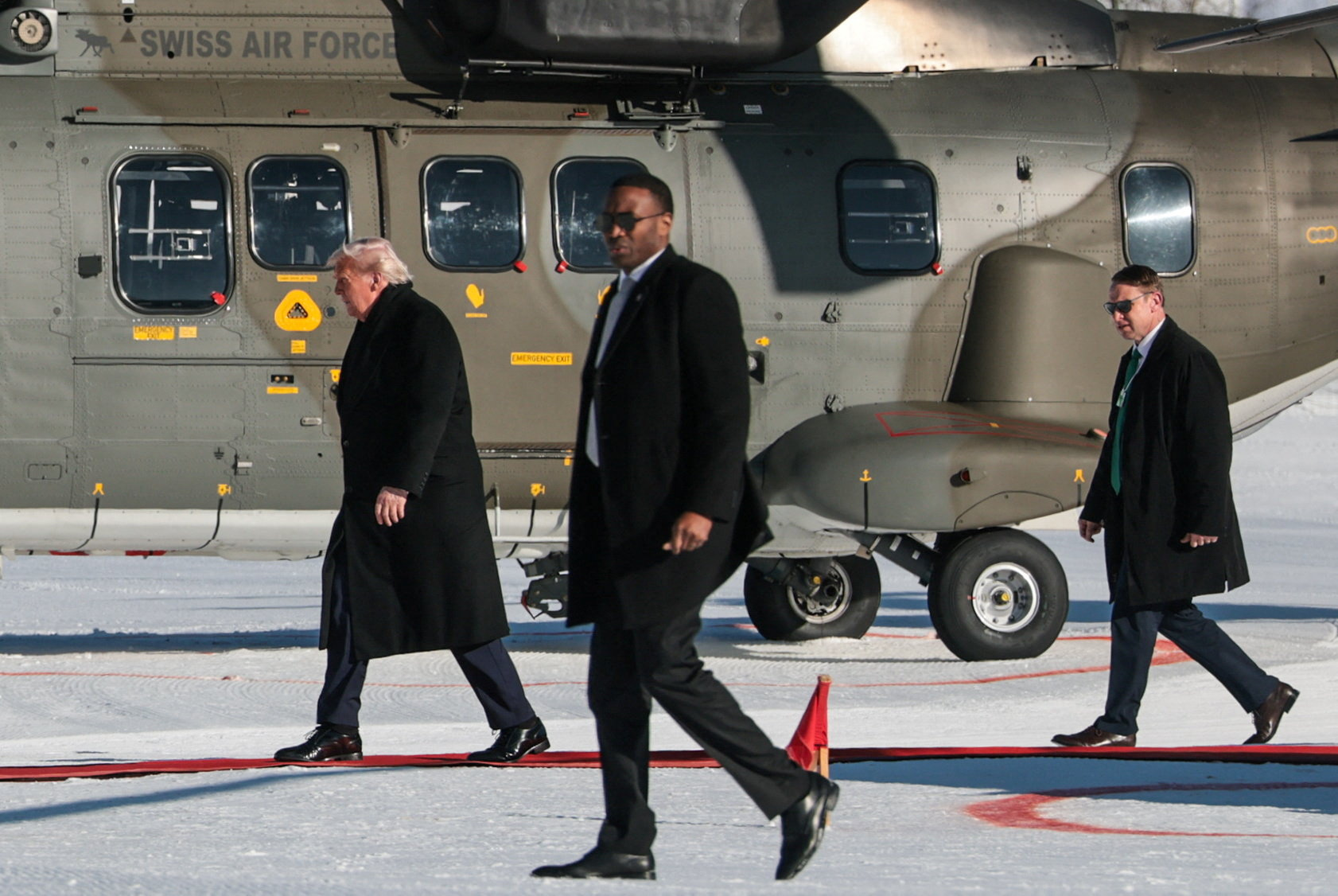 U.S. President Donald Trump after disembarking Marine One, as he arrives in Davos to attend the 56th annual World Economic Forum (WEF), in Davos, Switzerland, January 21, 2026. REUTERS/Jonathan Ernst