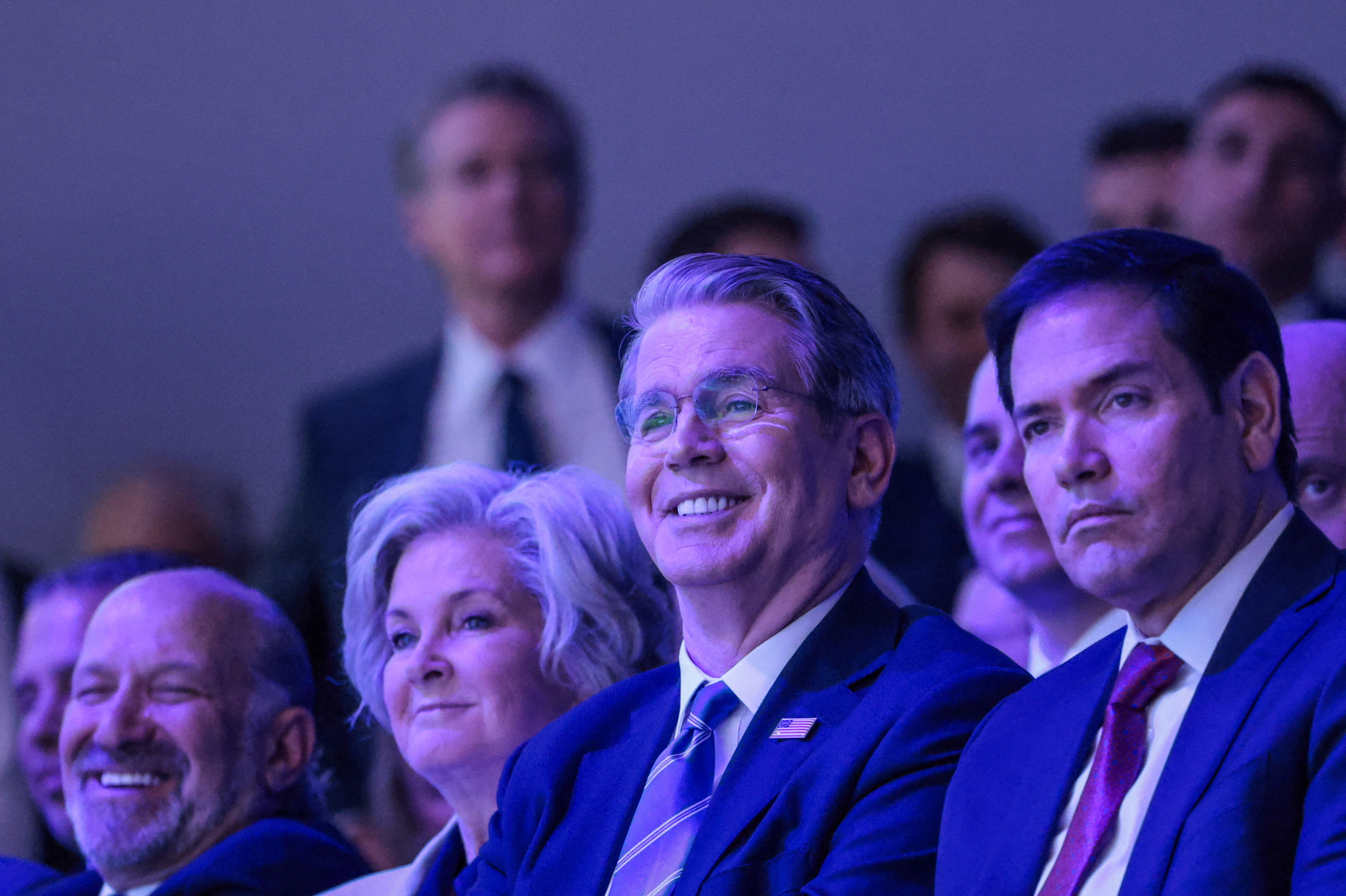 U.S. Commerce Secretary Howard Lutnick, White House chief of staff Susie Wiles, Treasury Secretary Scott Bessent and Secretary of State Marco Rubio attend the 56th annual World Economic Forum