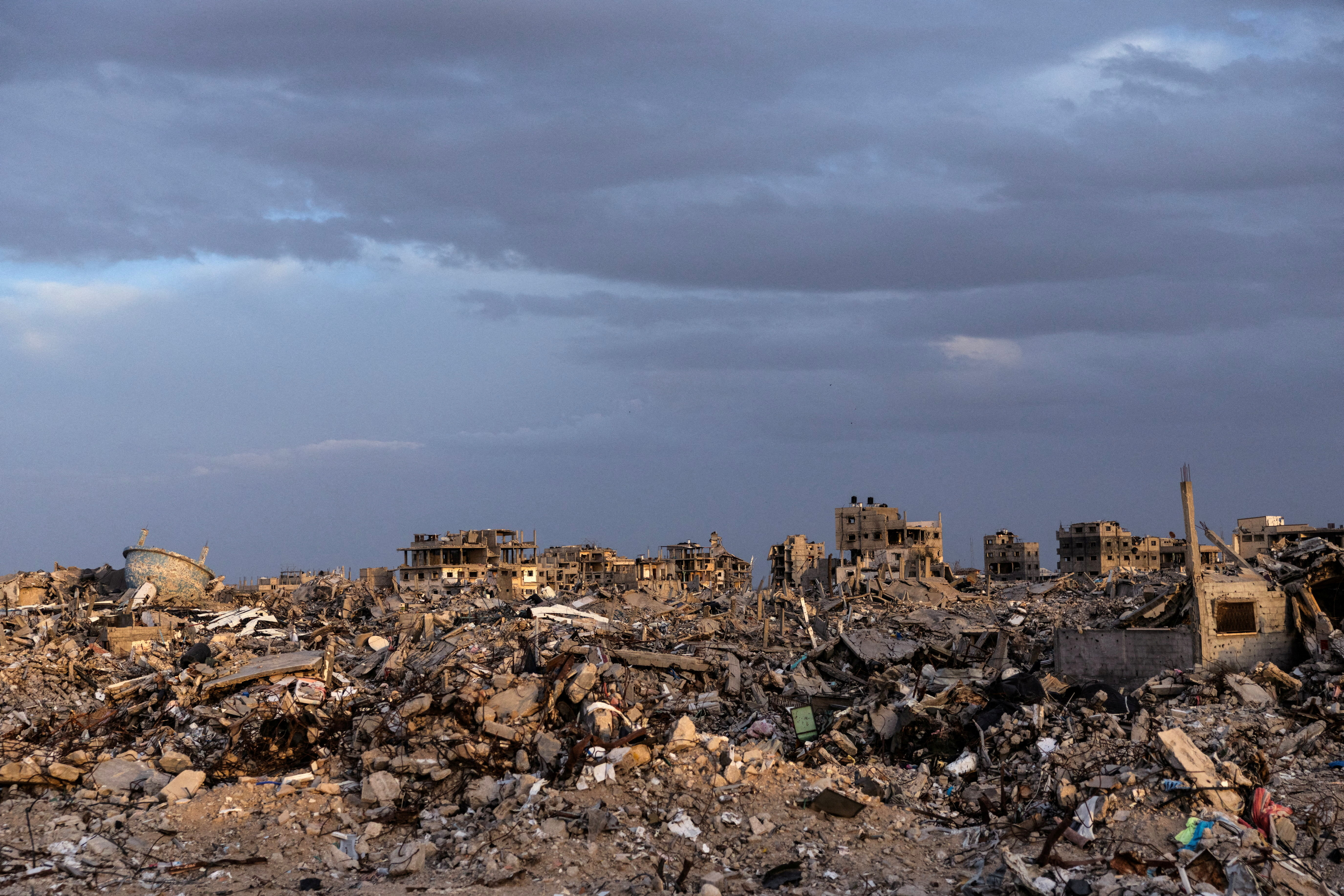 FILE PHOTO: Buildings lie in ruins amidst the rubble in Rafah, in the southern Gaza Strip, on December 8, 2025.