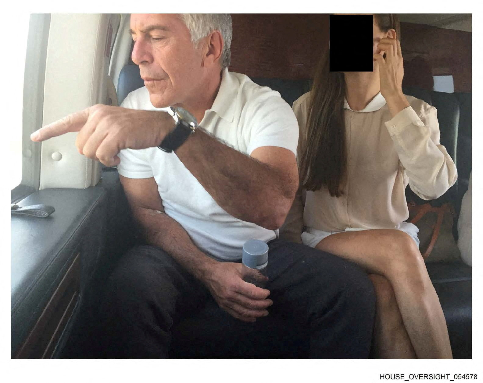 Late financier and convicted sex offender Jeffrey Epstein appears with a woman, whose identity has been obscured, in this image from the Epstein estate released by House Oversight Committee Democrats