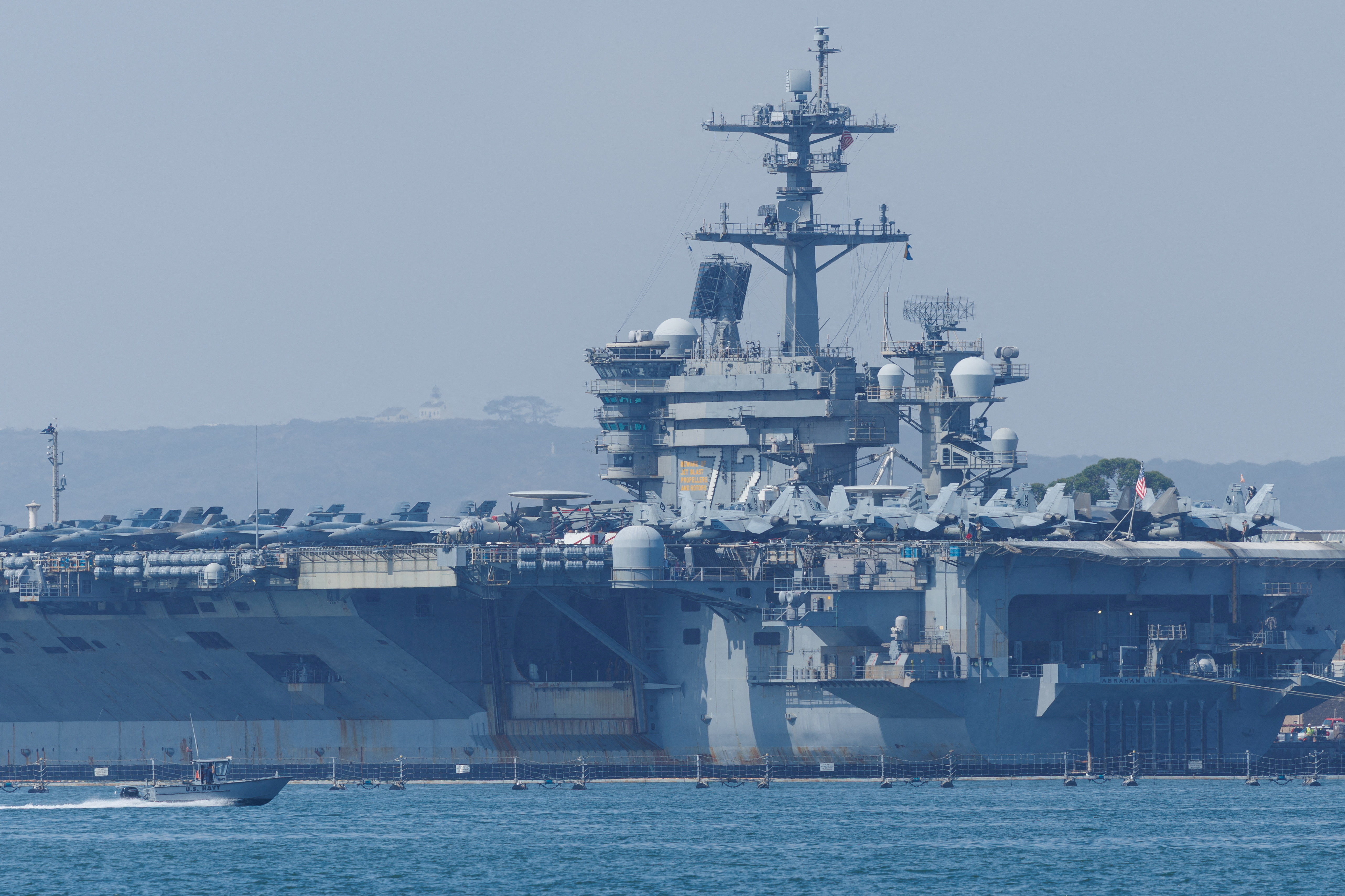 The USS Abraham Lincoln (CVN-72), a Nimitz-class nuclear-powered aircraft carrier, is shown at Naval Air Station North Island in San Diego, California, U.S. August 11, 2025.