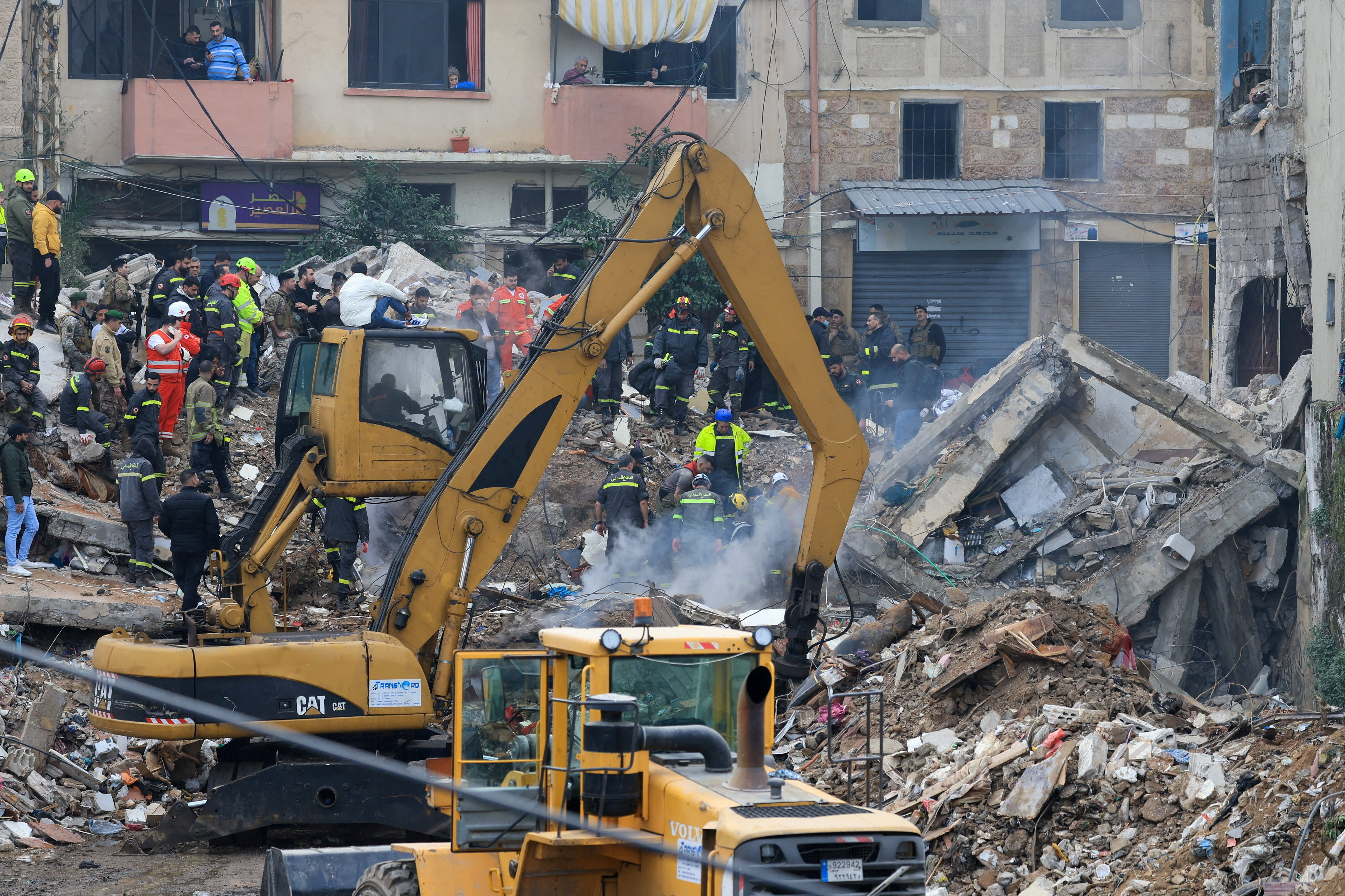 Rescue workers work at the site where a residential building collapsed in Tripoli, Lebanon, February 9, 2026.