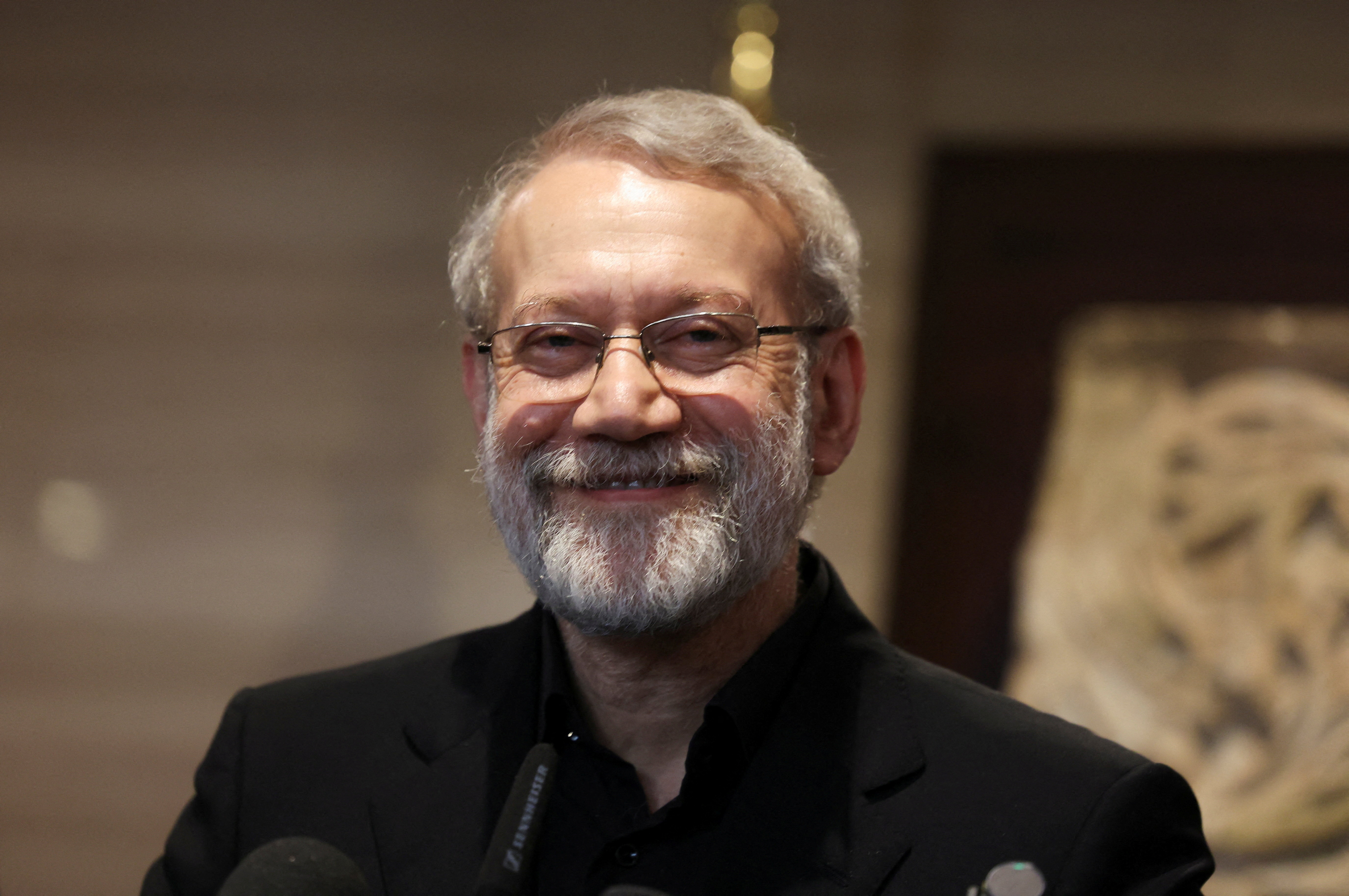 Iran's Supreme National Security Council Secretary Ali Larijani reacts during a visit to Beirut, Lebanon August 13, 2025.