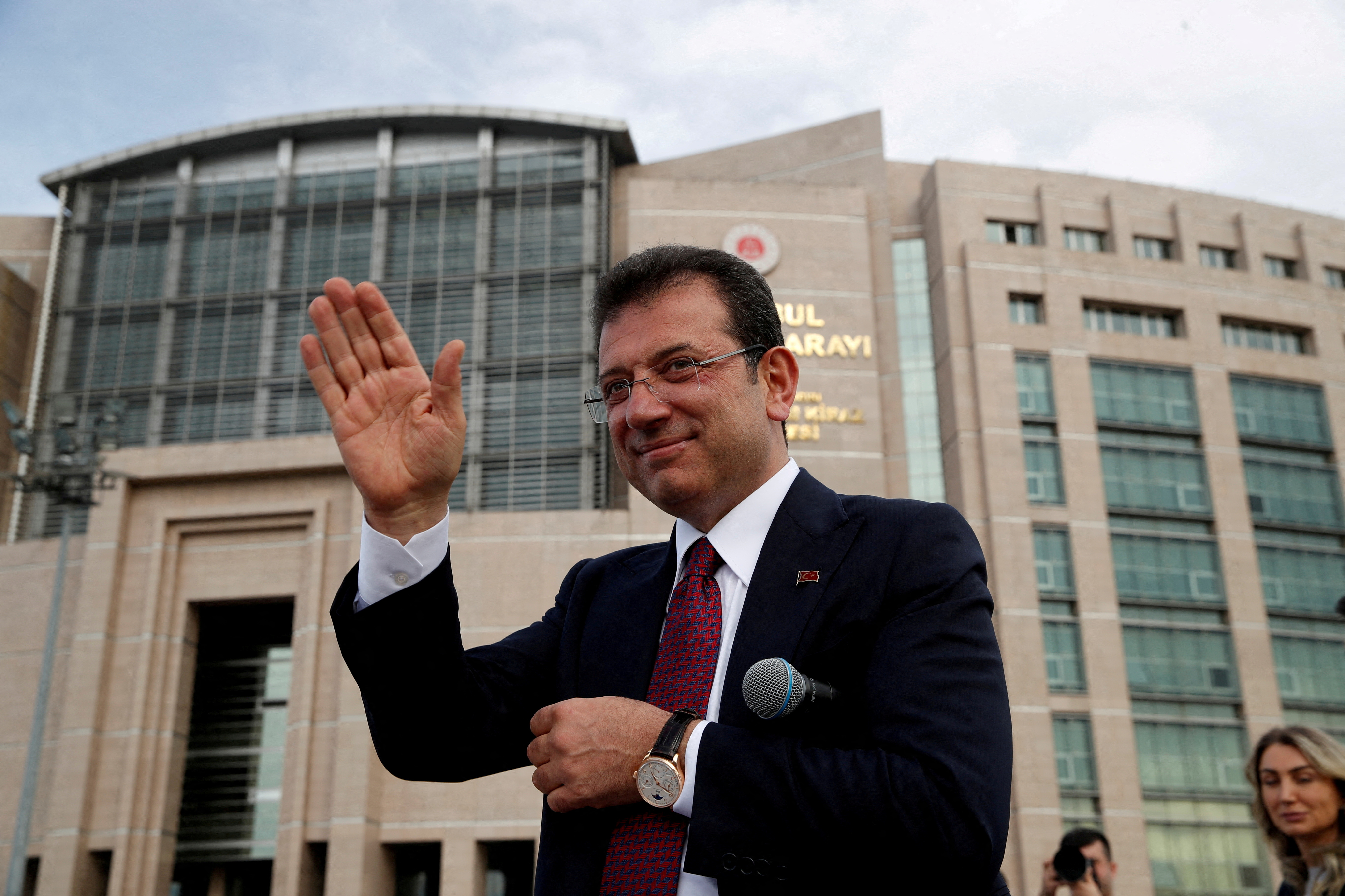 Istanbul Mayor Ekrem Imamoglu, re-elected on Sunday, greets his supporters after receiving mayoral certificate in front of the Caglayan Courthouse in Istanbul, Turkey April 3, 2024. REUTERS/Dilara Senkaya/File Photo