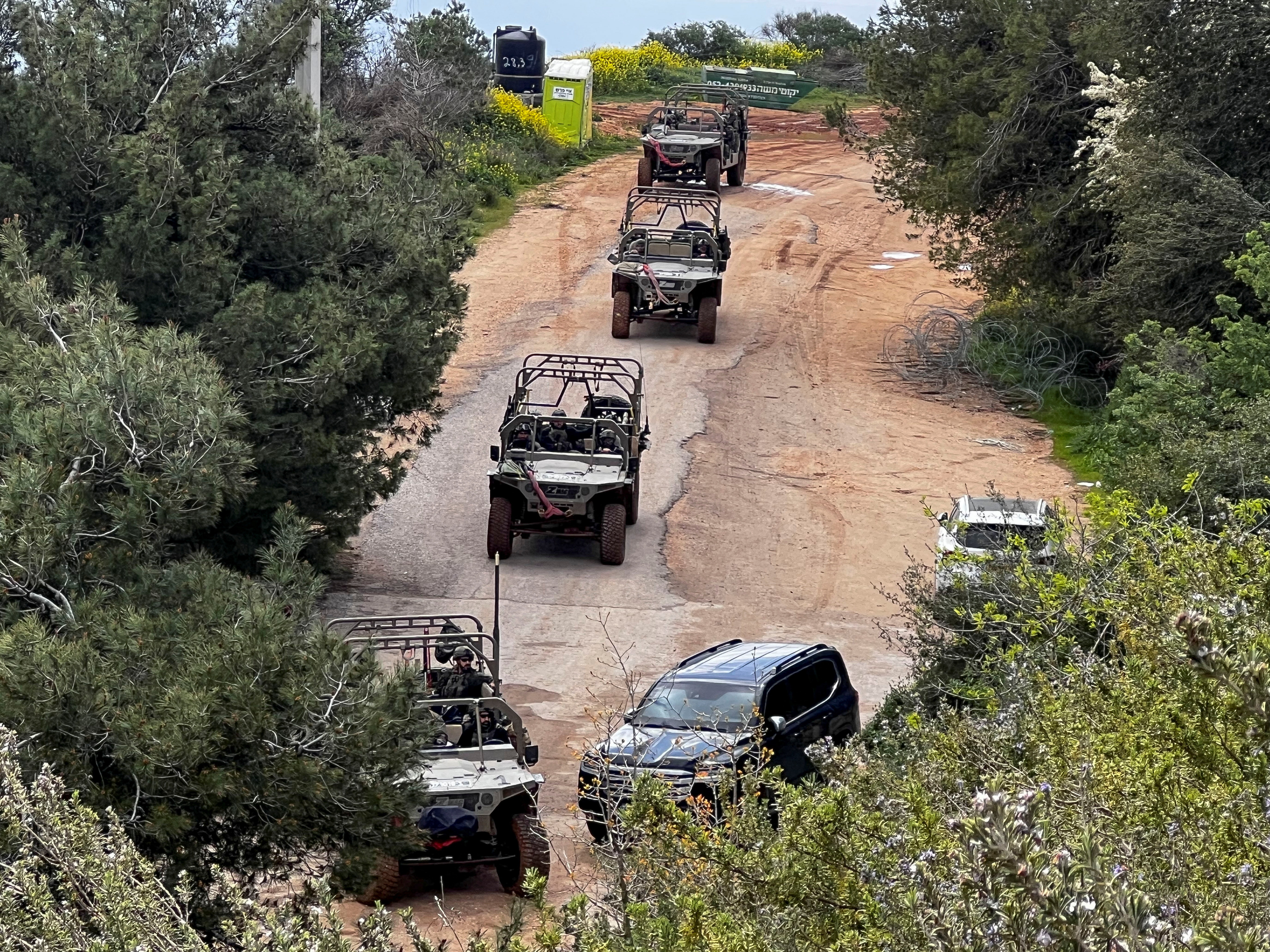 Israeli soldiers in military vehicles on the Israeli side of the Israel-Lebanon border, amid escalation between Hezbollah and Israel, and amid the U.S.-Israeli conflict with Iran, in northern Israel, March 16, 2026.