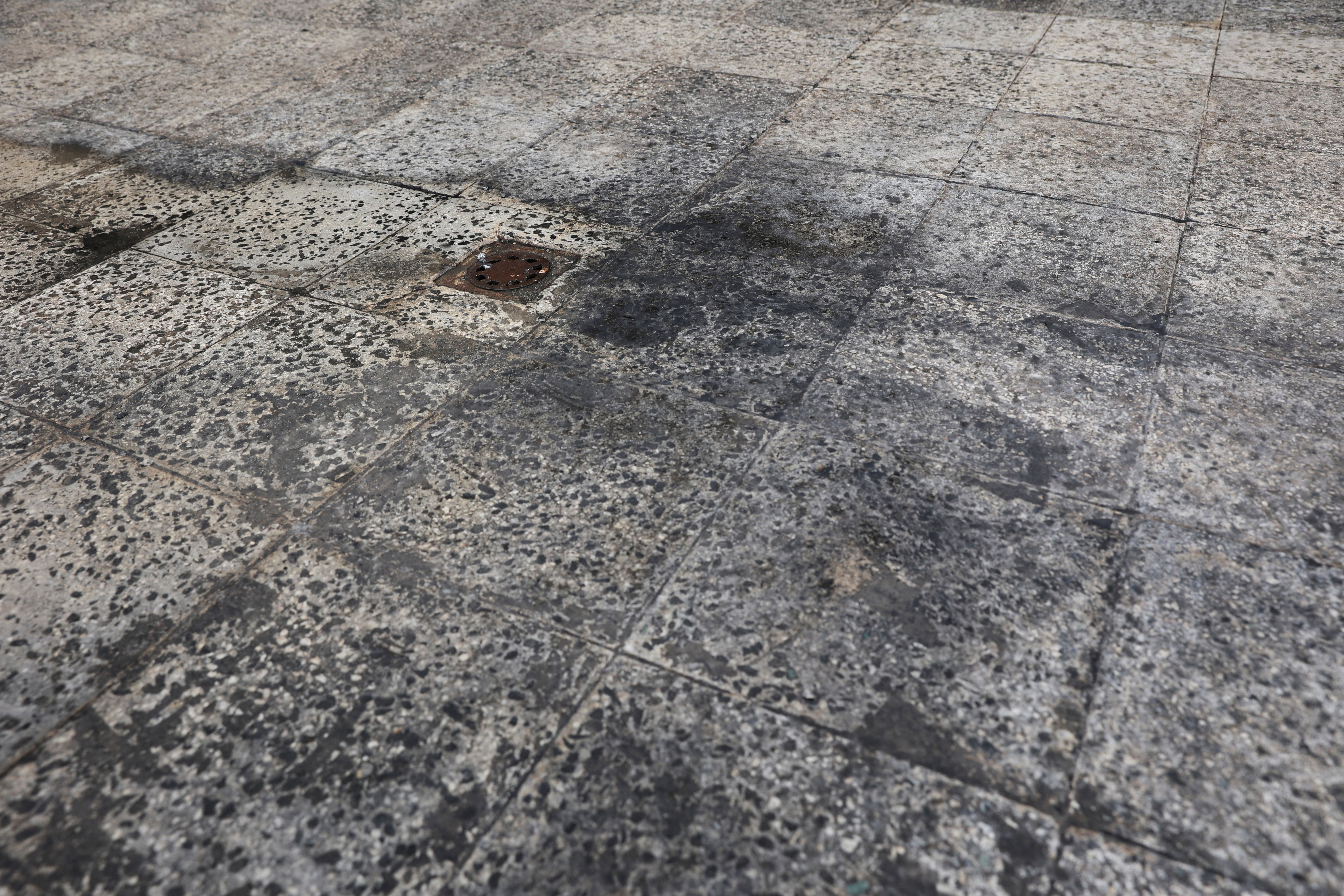 Black soot after reported black rain following a strike on fuel tanks, amid the U.S.-Israeli conflict with Iran, in Tehran, Iran, March 10, 2026.