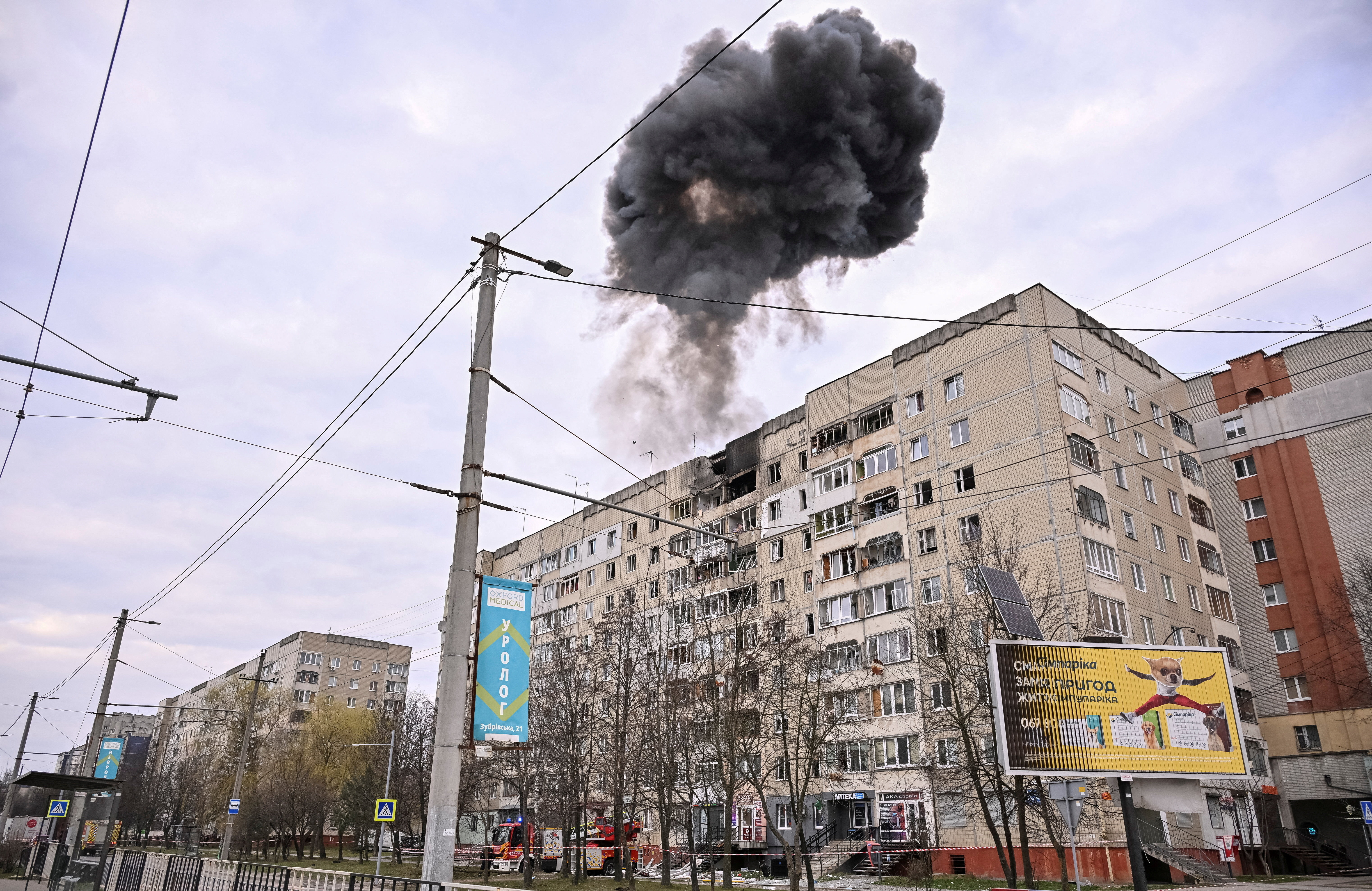Smoke rises as a Russian drone hits an apartment building. REUTERS/Stringer     TPX IMAGES OF THE DAY
