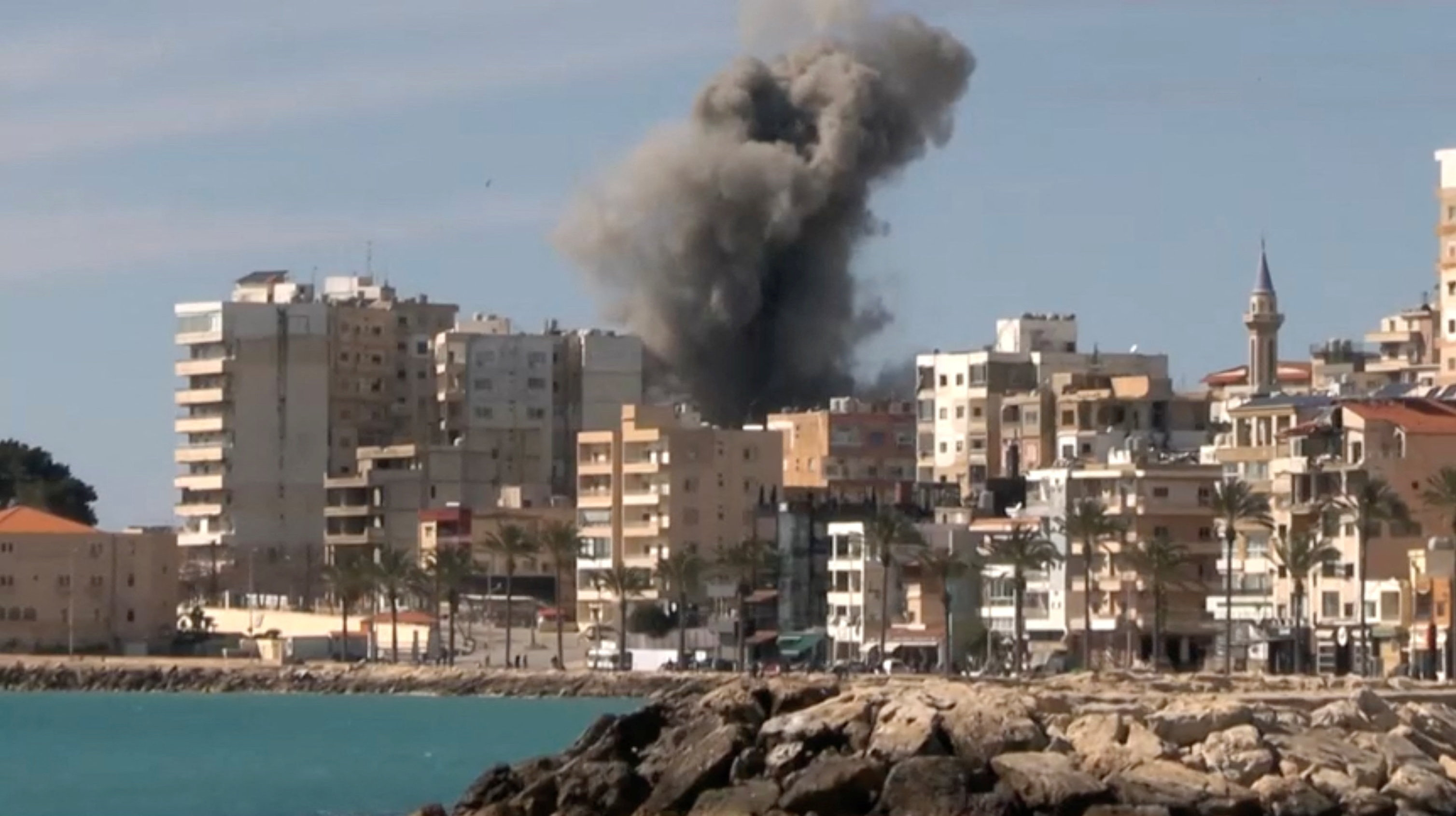 Smoke rises following an Israeli strike, in this screen grab taken from a video, amid escalating hostilities between Israel and Hezbollah, as the U.S.-Israeli conflict with Iran continues, in Tyre, Lebanon, March 24, 2026.
