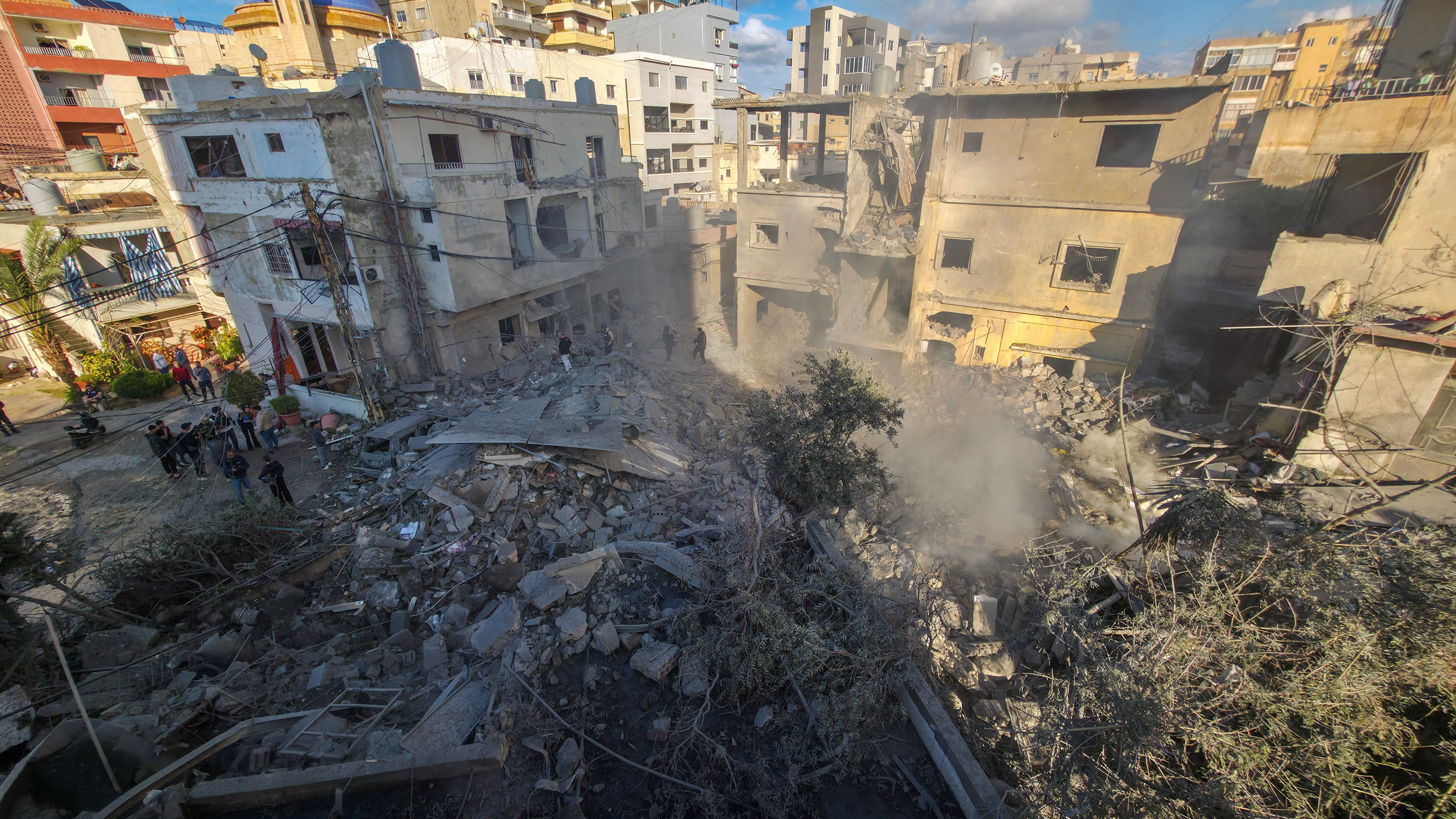 Smoke rises fromt the debris of a building following an Israeli strike, amid escalating hostilities between Israel and Hezbollah, as the U.S.-Israeli conflict with Iran continues, in Tyre, Lebanon