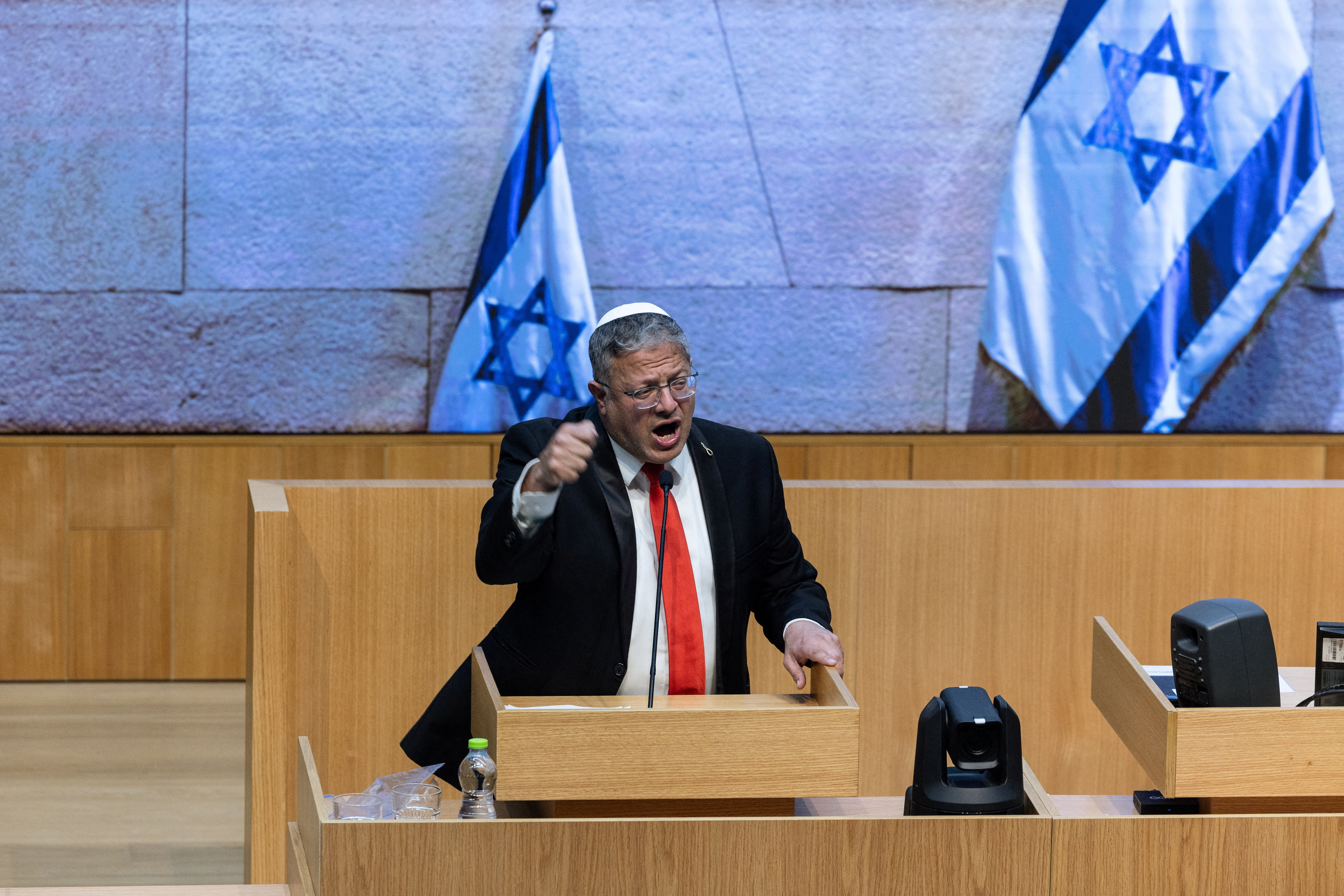 Israel's far-right National Security Minister Itamar Ben-Gvir speaks during a session as Israel's parliament passes a law on Monday making the death penalty a default sentence for Palestinians convicted in military courts