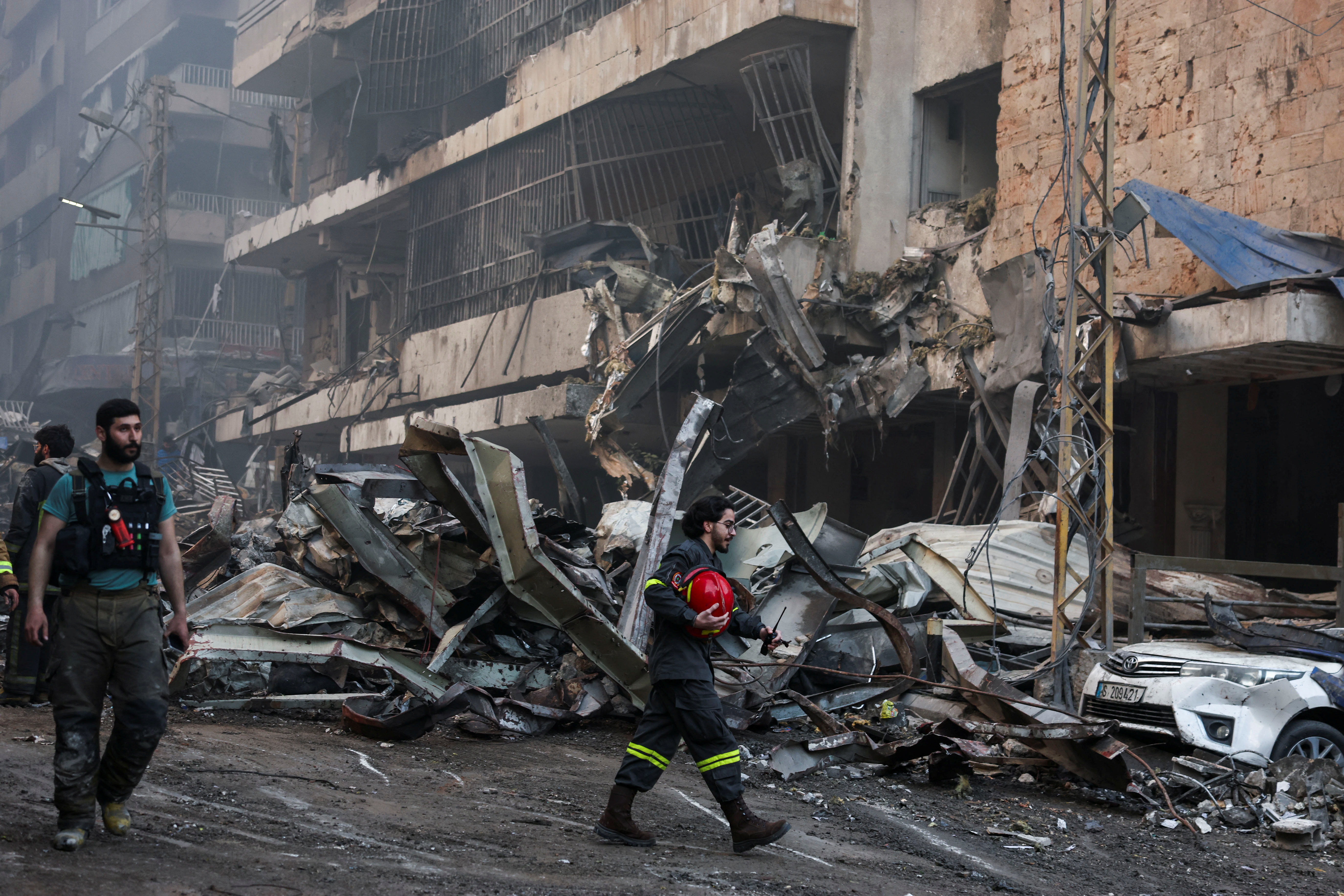 An emergency responder works at the site of an Israeli strike, in Al-Mazraa in Beirut, Lebanon, April 8, 2026.