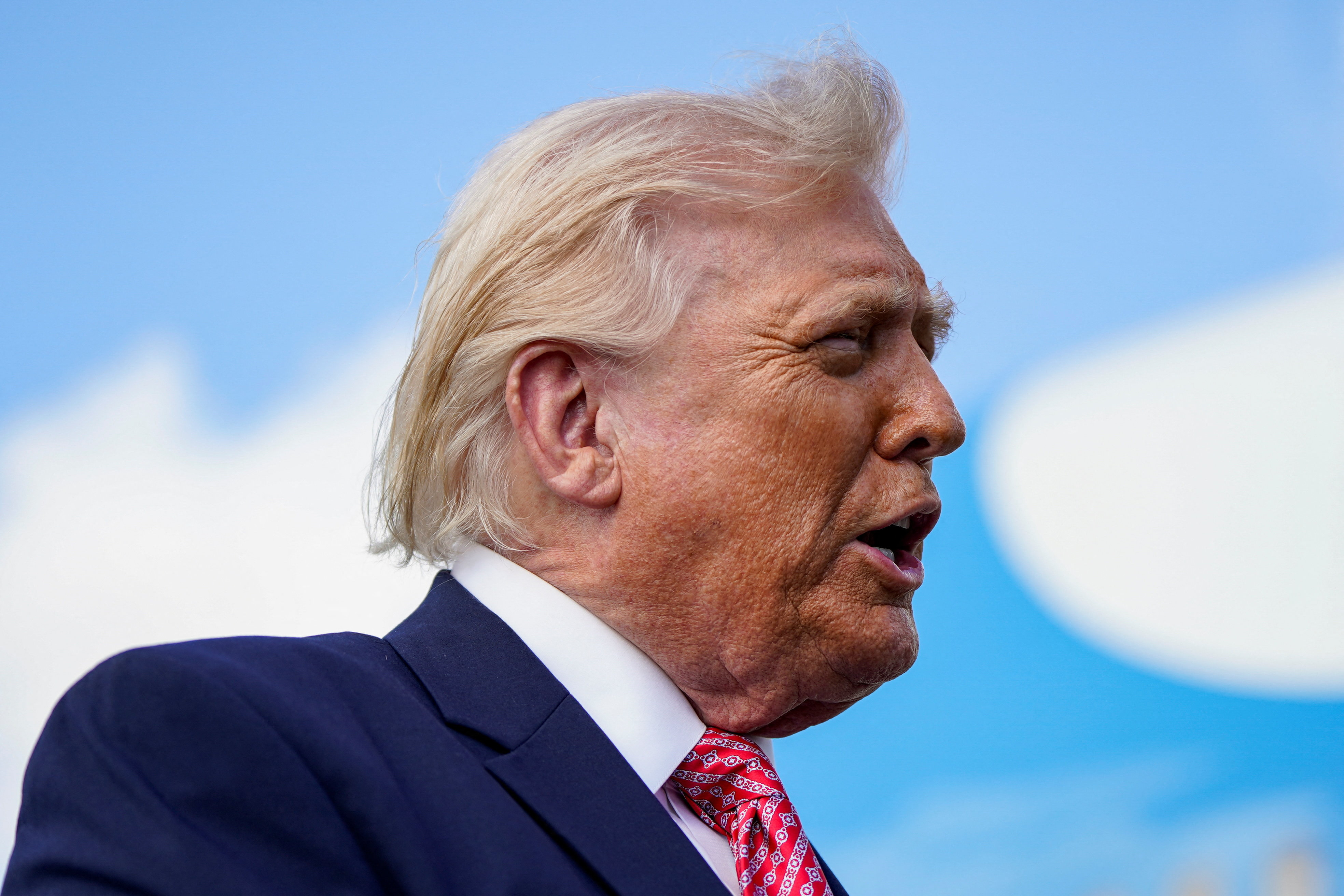 U.S. President Donald Trump speaks to the media as he arrives at Miami International Airport in Miami, Florida, U.S., March 27, 2026. REUTERS/Elizabeth Frantz
