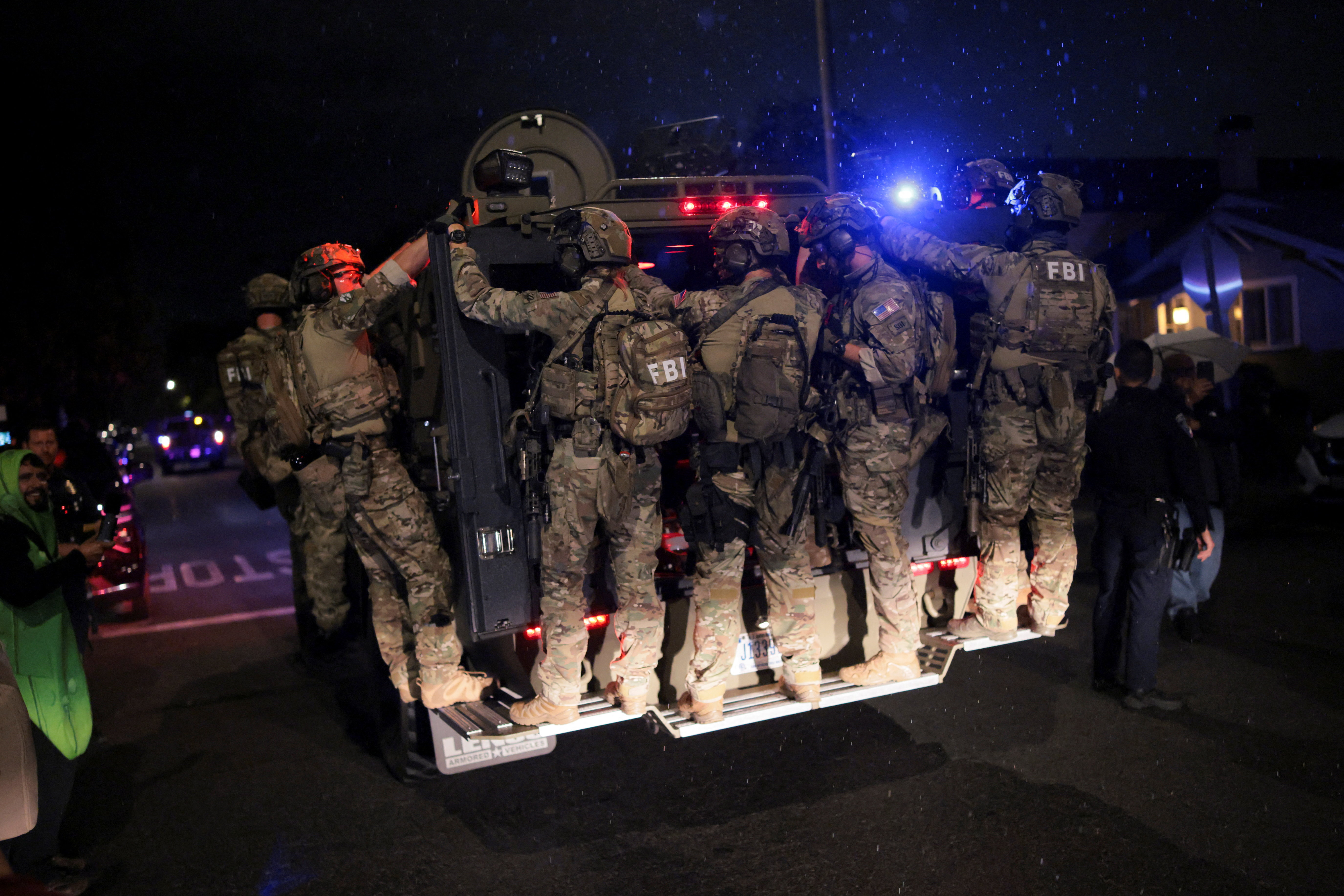 FBI agents leave the residence associated with Cole Tomas Allen, the suspect in the shooting incident at the annual White House Correspondents' Association dinner in Washington, D.C., in Torrance, California, U.S., April 26, 2026.