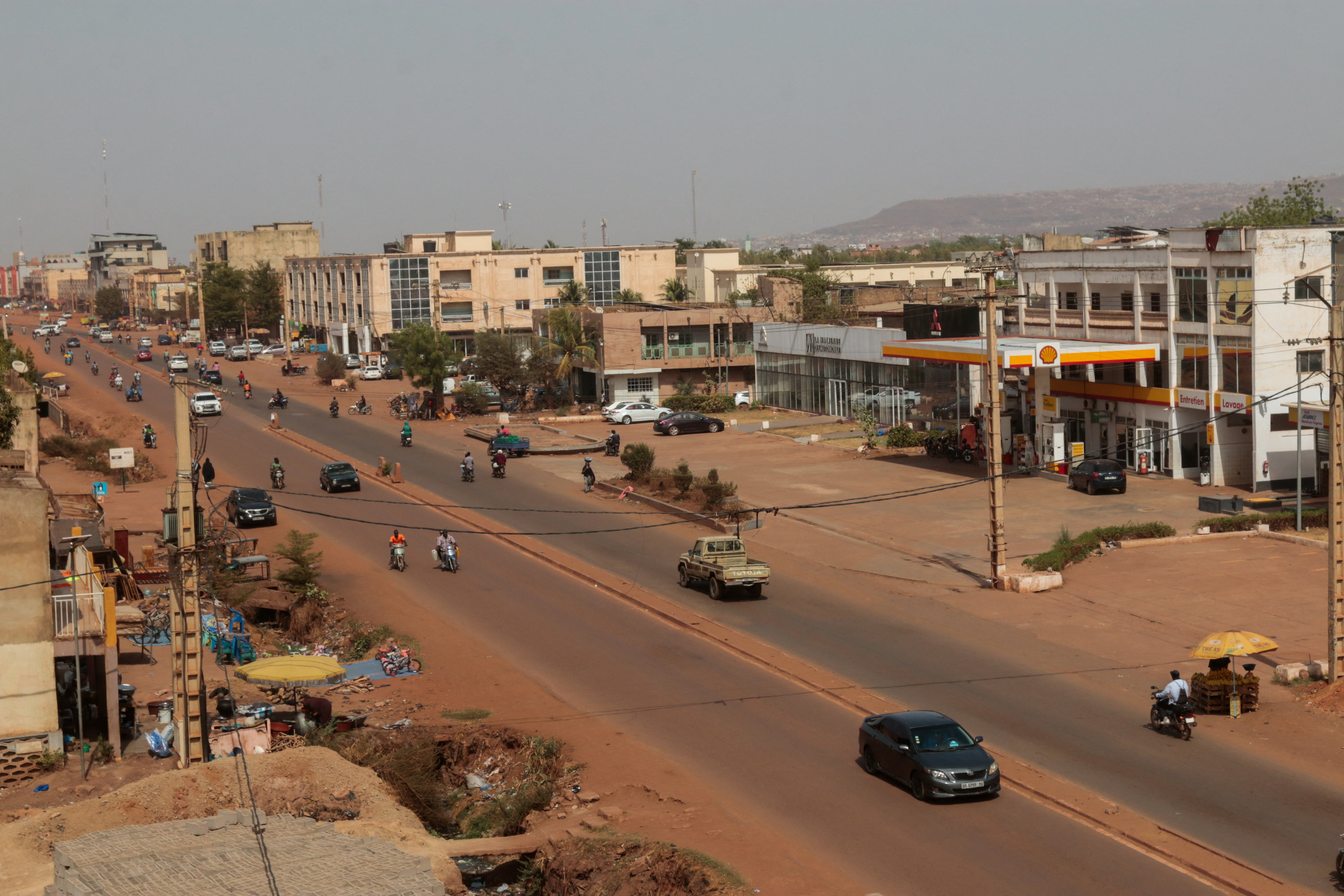People move on a street after insurgents launched attacks on military bases across the country, in Bamako, Mali April 25, 2026.