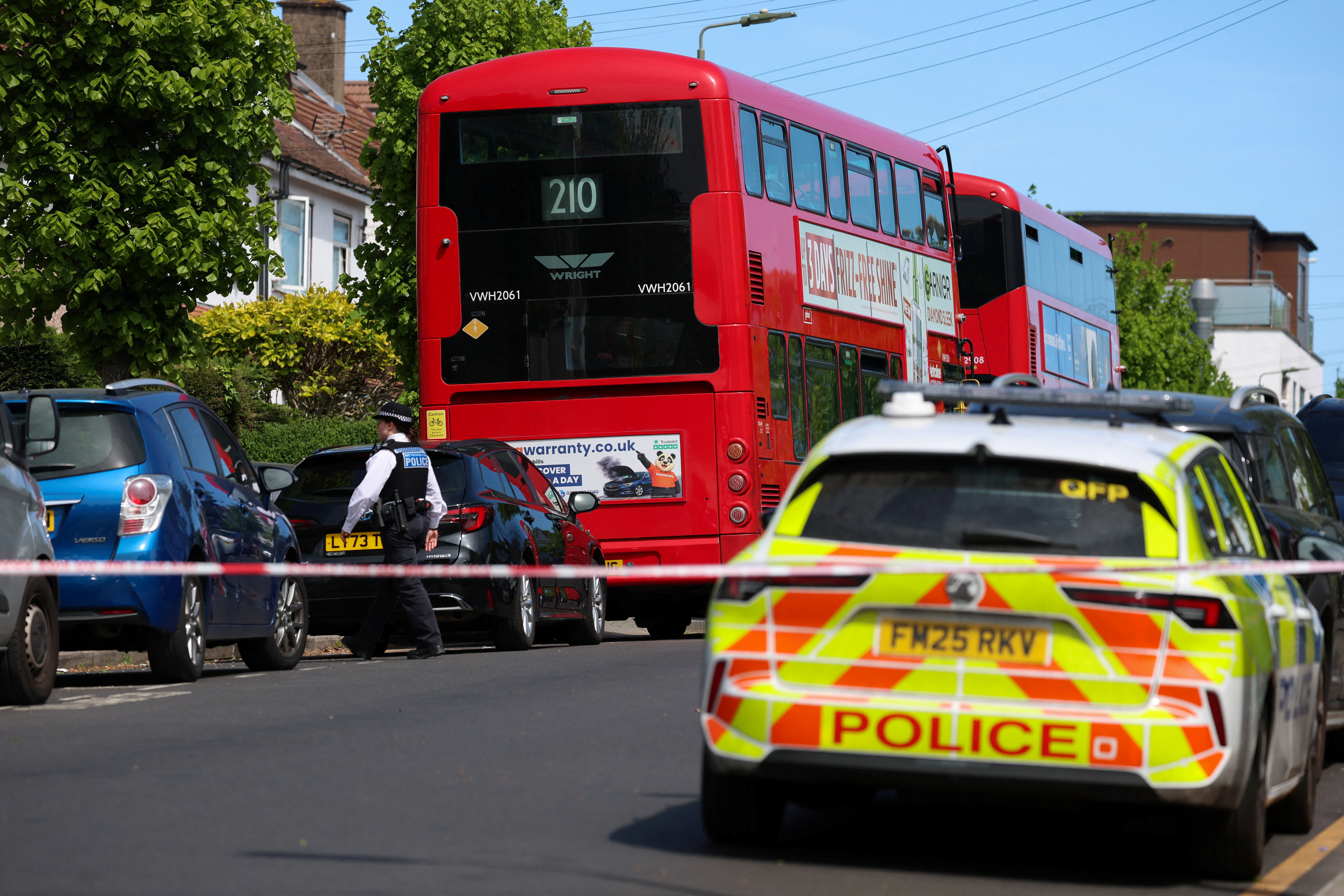 A police officer walks at the scene, after a man was arrested following a stabbing incident in the Golders Green area, which is home to a large Jewish population, in London, Britain, April 29, 2026. REUTERS/Hannah McKay