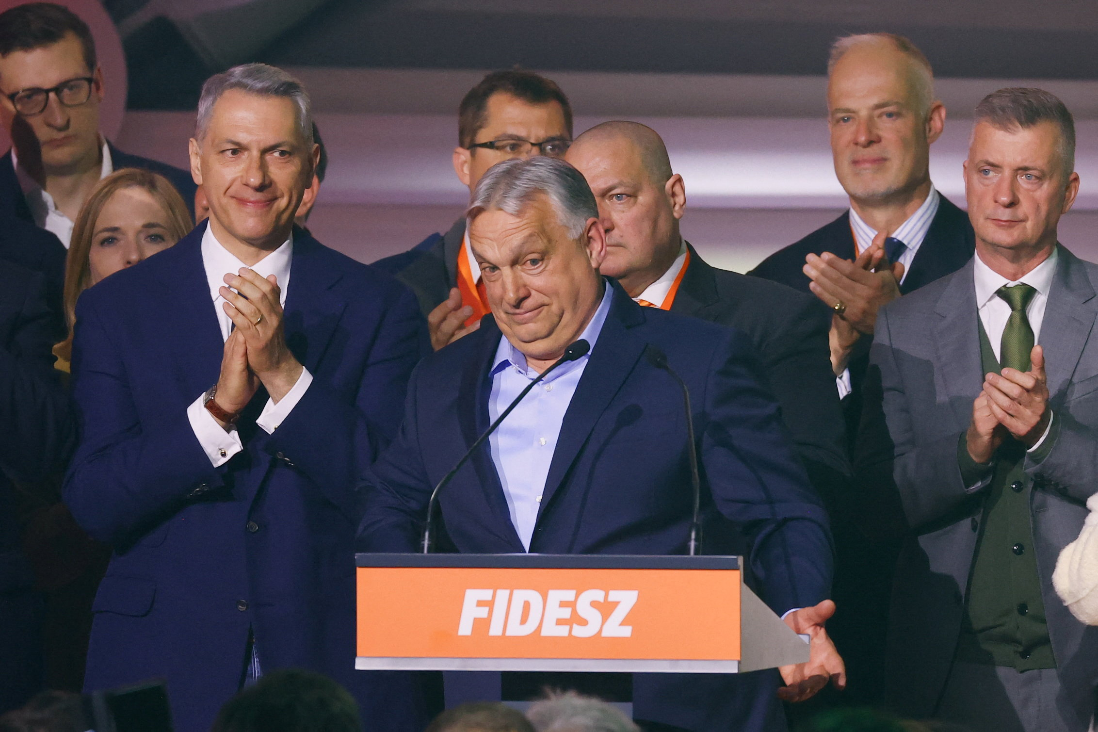 Hungarian Prime Minister Viktor Orban reacts as he addresses supporters after the announcement of the partial results of parliamentary election in Budapest, Hungary, April 12, 2026.