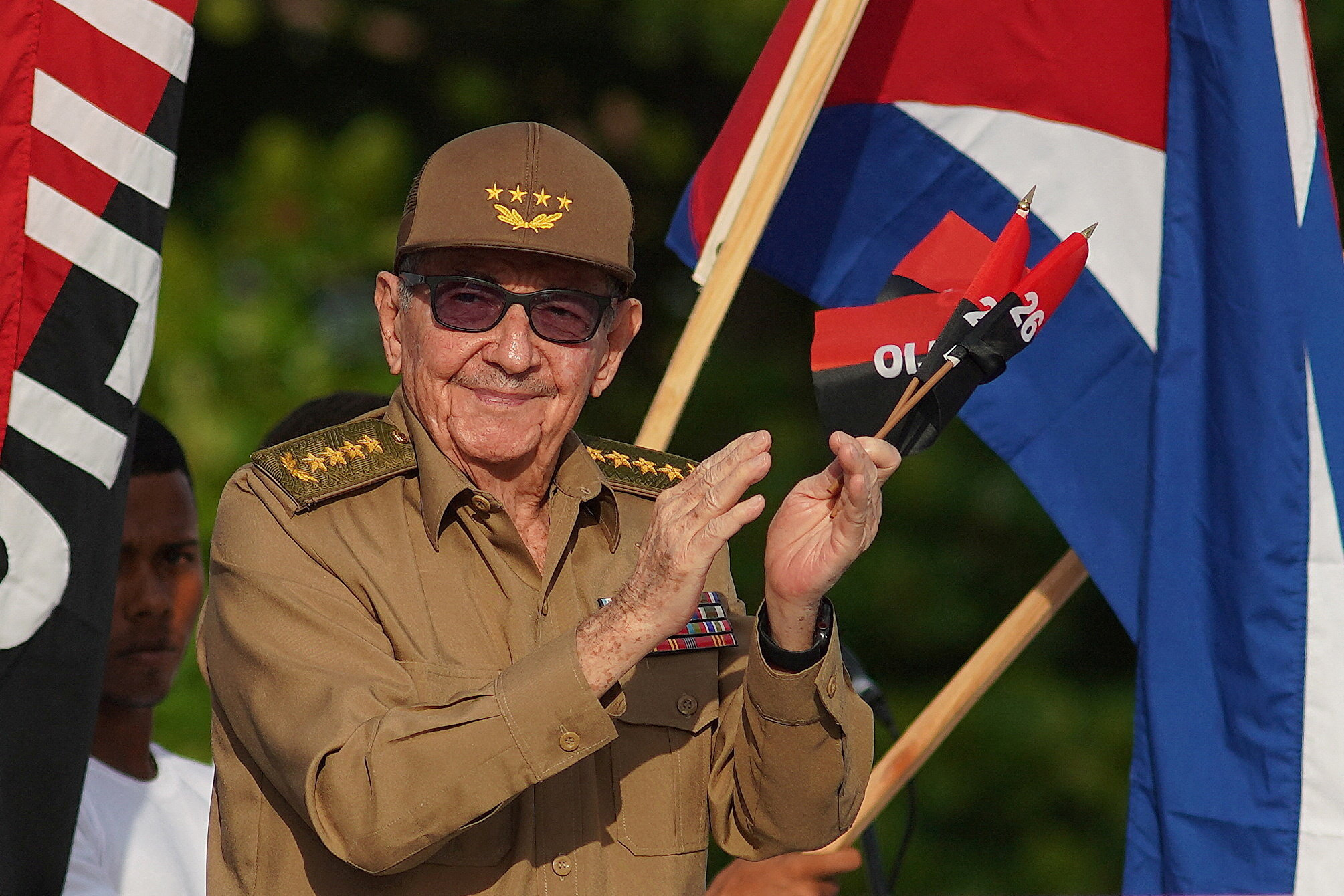 FILE PHOTO: Cuba's former President Raul Castro claps during a ceremony marking the 69th anniversary of the July 26, 1953 rebel assault which late Cuban leader Fidel Castro led on the Moncada army barracks, in Cienfuegos, Cuba, July 26, 2022.