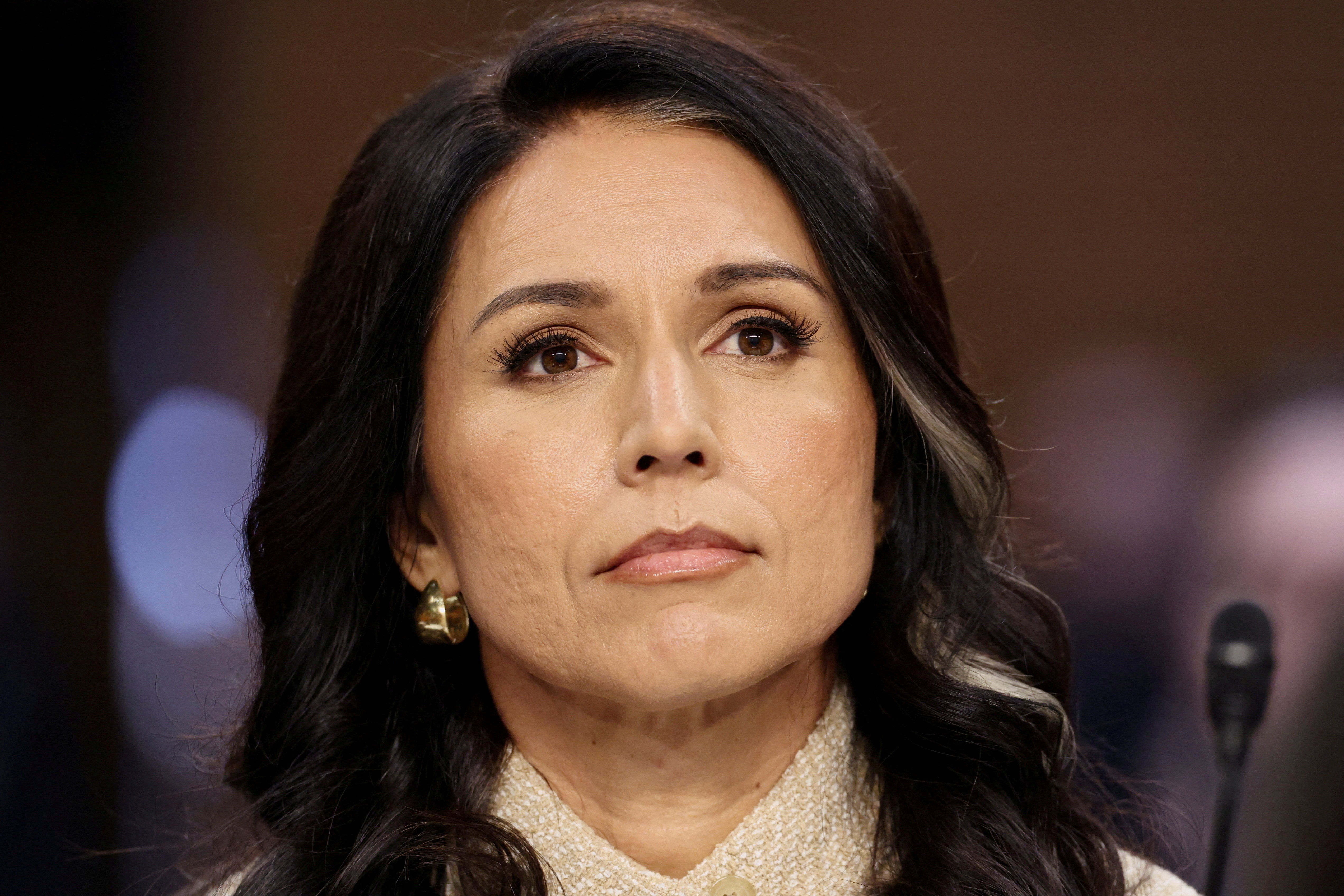 FILE PHOTO: Director of National Intelligence (DNI) Tulsi Gabbard testifies before a Senate Intelligence Committee hearing on Capitol Hill in Washington, D.C., U.S., March 18, 2026.