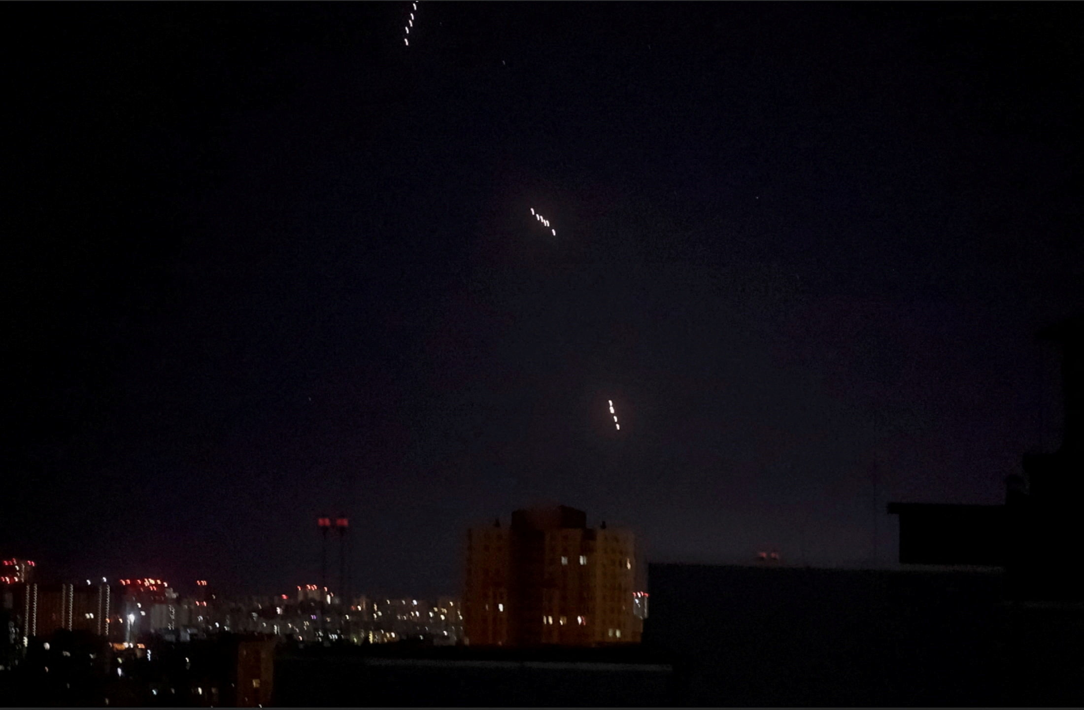 Russian missiles, which appear to be the Oreshnik hypersonic ballistic missile, according to the Ukrainian Air Force, fly during a Russian missile and drone strike, amid Russia's attack on Ukraine, in Kyiv, Ukraine in this screen grab