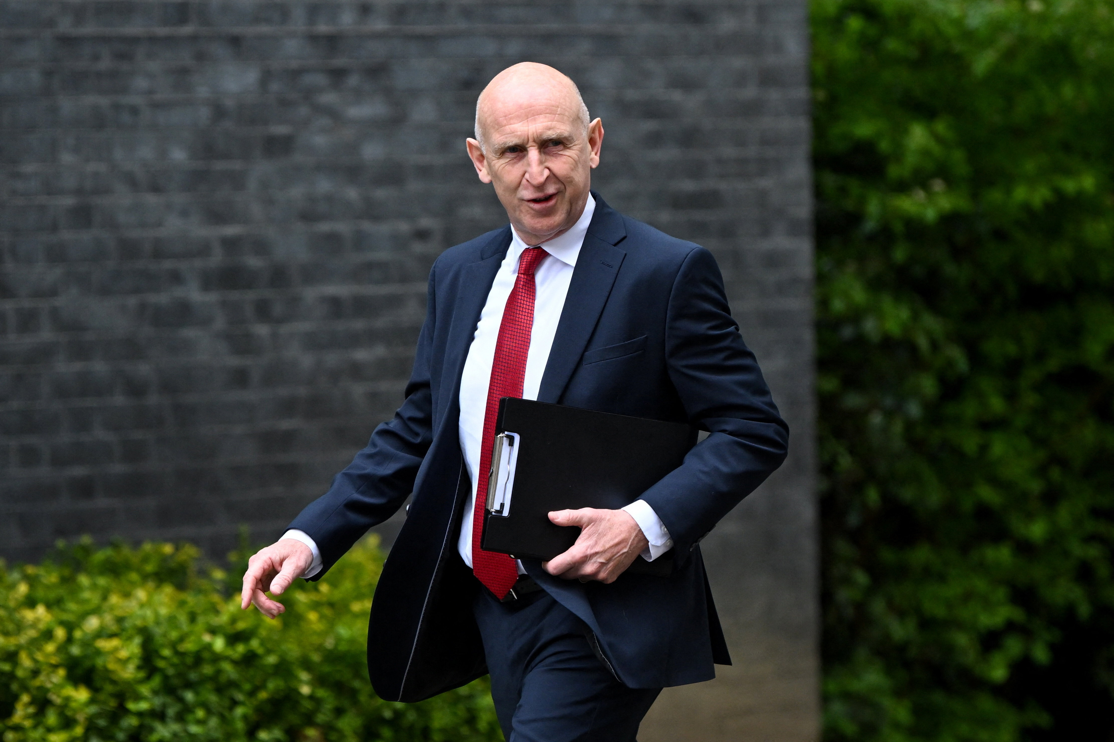 British Defence Secretary John Healey walks outside 10 Downing Street, on the day of a cabinet meeting, in London, Britain, May 19, 2026.