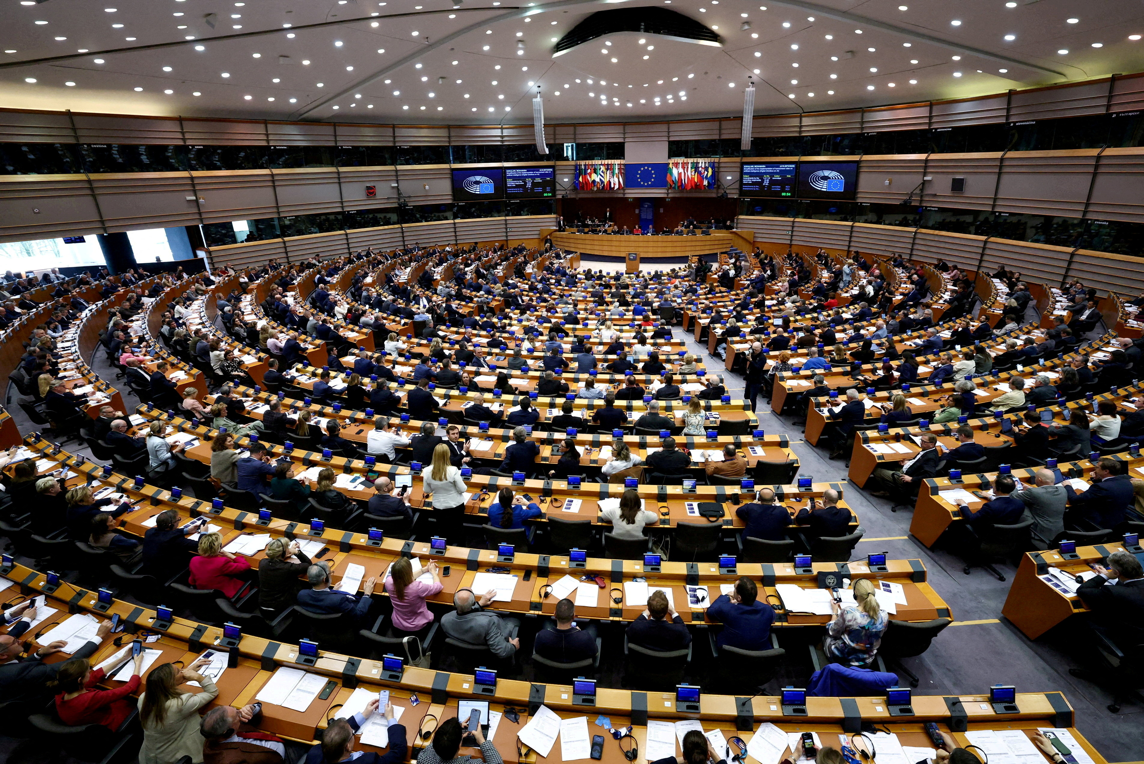 FILE PHOTO: Members of the European Parliament attend a session to vote on legislation to cut import duties for U.S. products, in Brussels, Belgium March 26, 2026.
