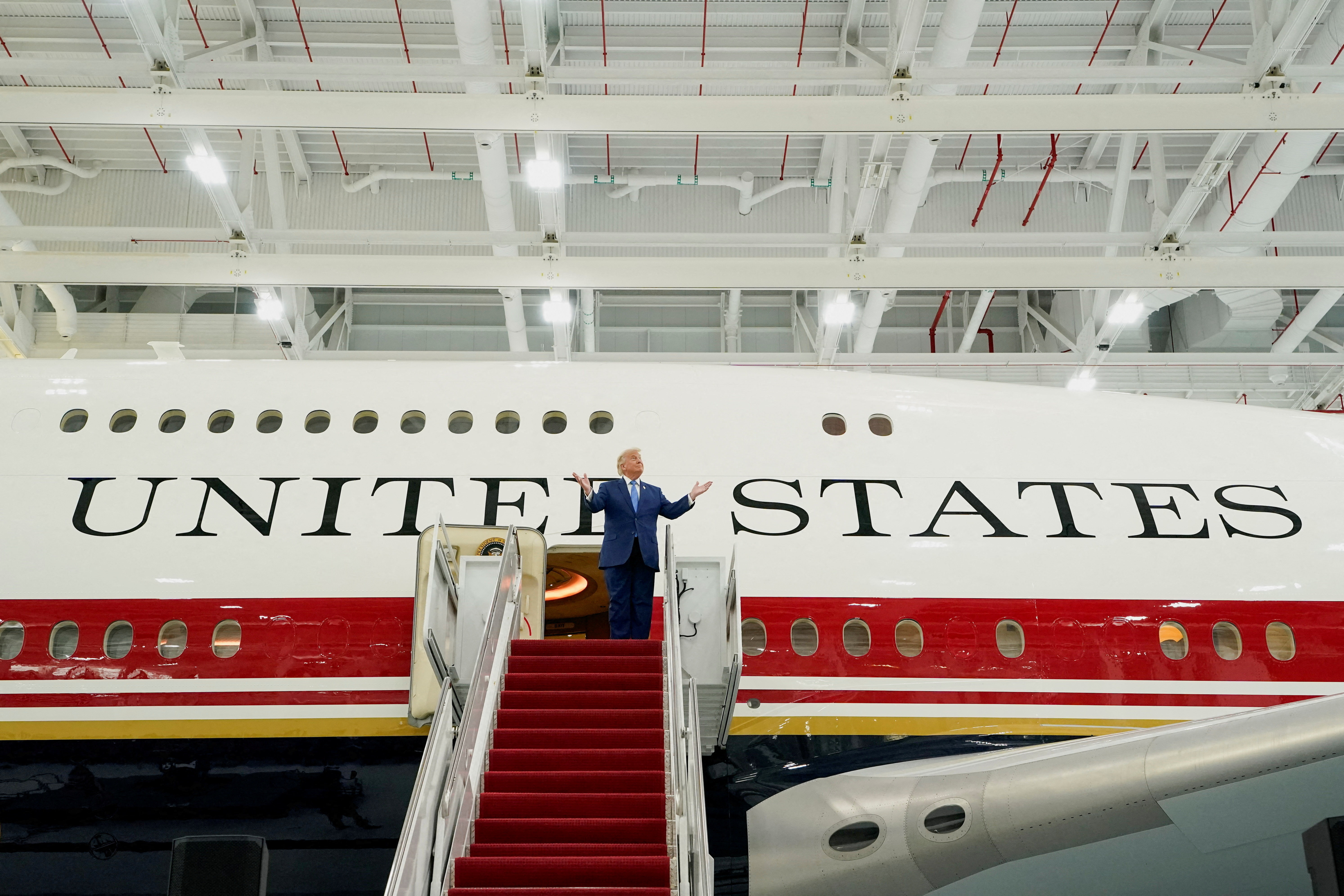 U.S. President Donald Trump gestures as he tours the VC-25B aircraft gifted by Qatar that will be used as Air Force One, at Joint Base Andrews, Maryland, U.S., June 19, 2026. REUTERS/Elizabeth Frantz     TPX IMAGES OF THE DAY