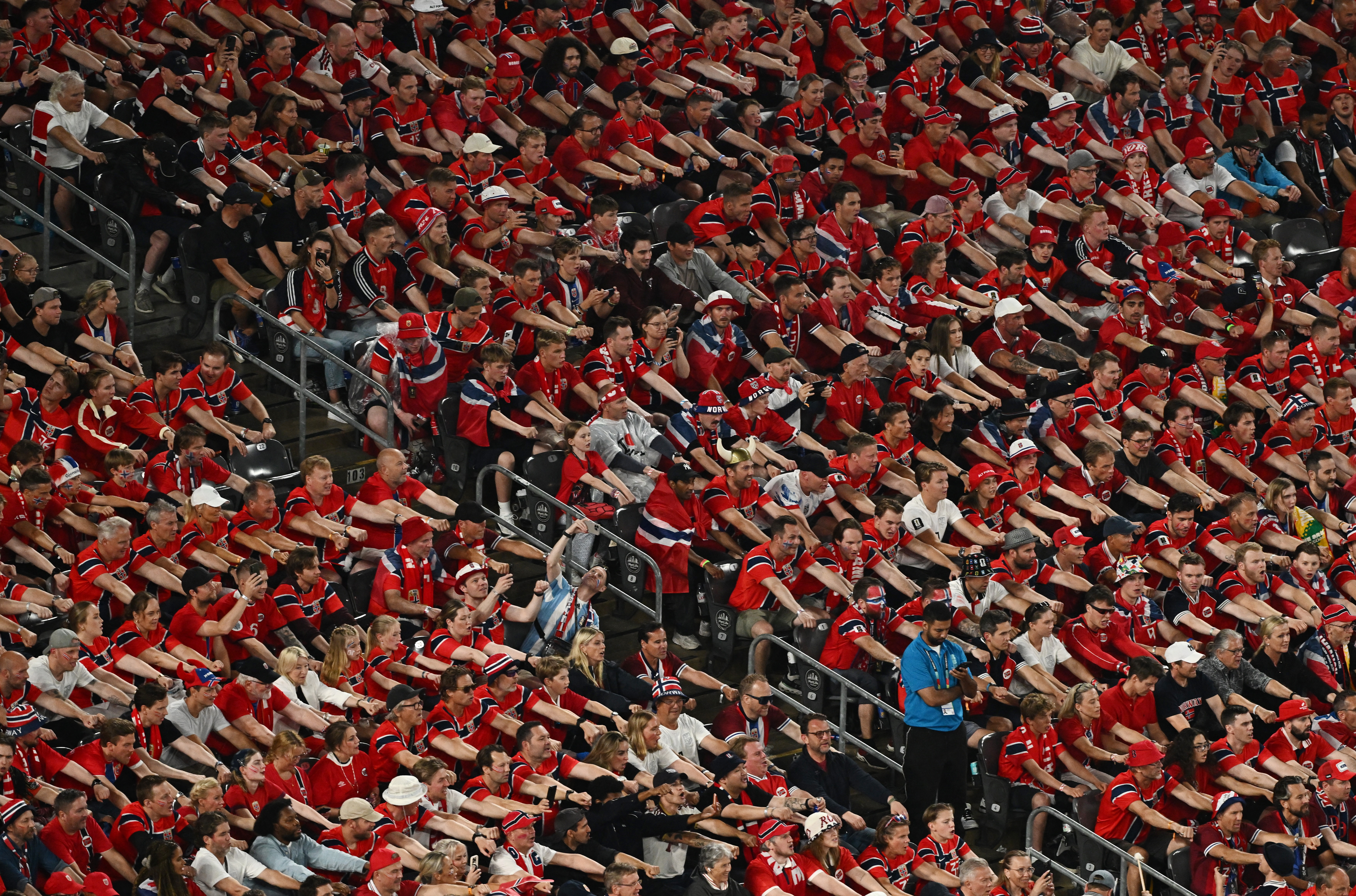 Norway fans do the traditional rowing celebration REUTERS/Dylan Martinez