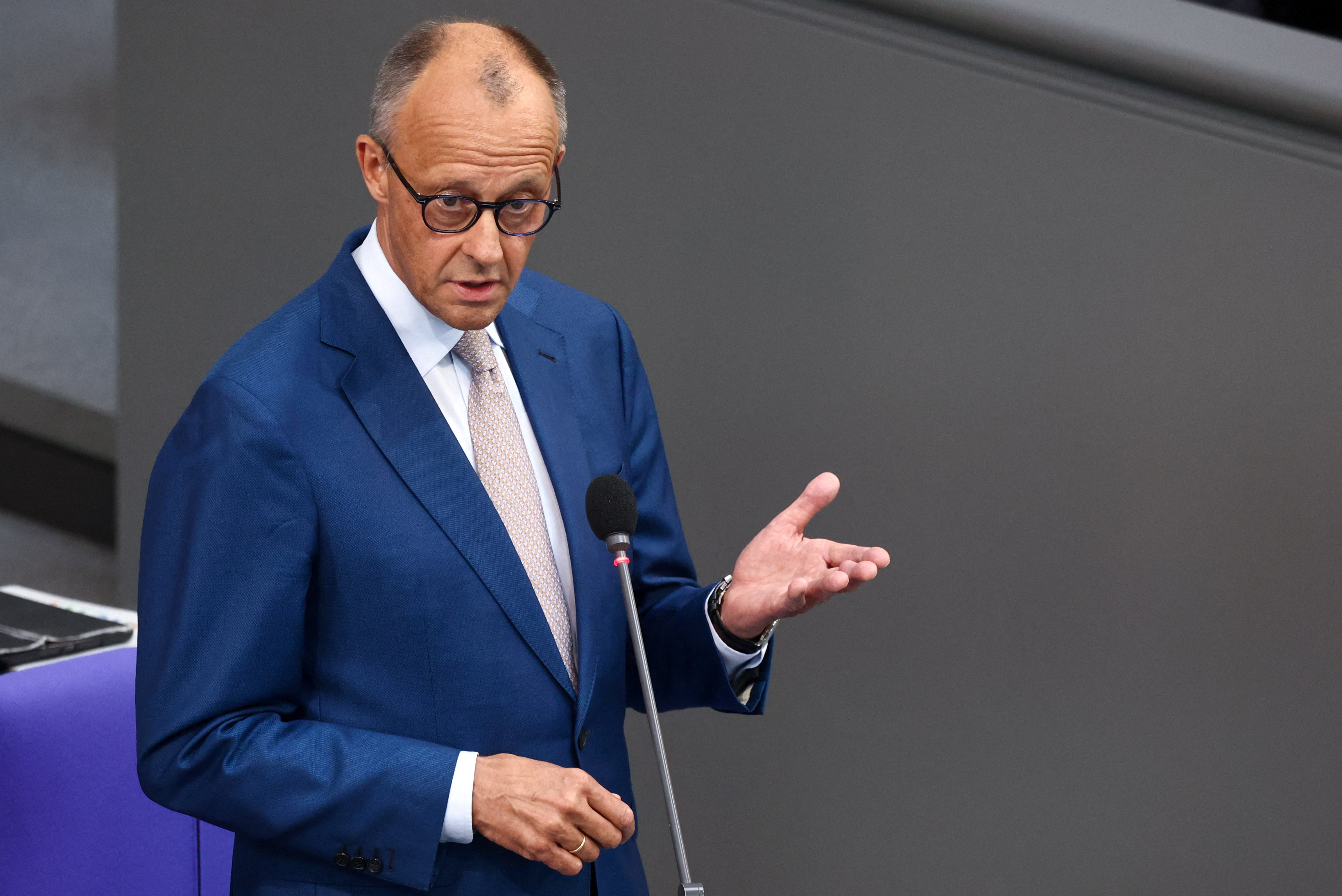 German Chancellor Friedrich Merz answers questions from lawmakers during a plenum session of the lower house of parliament, the Bundestag, in Berlin, Germany, June 24, 2026. REUTERS/Liesa Johannssen
