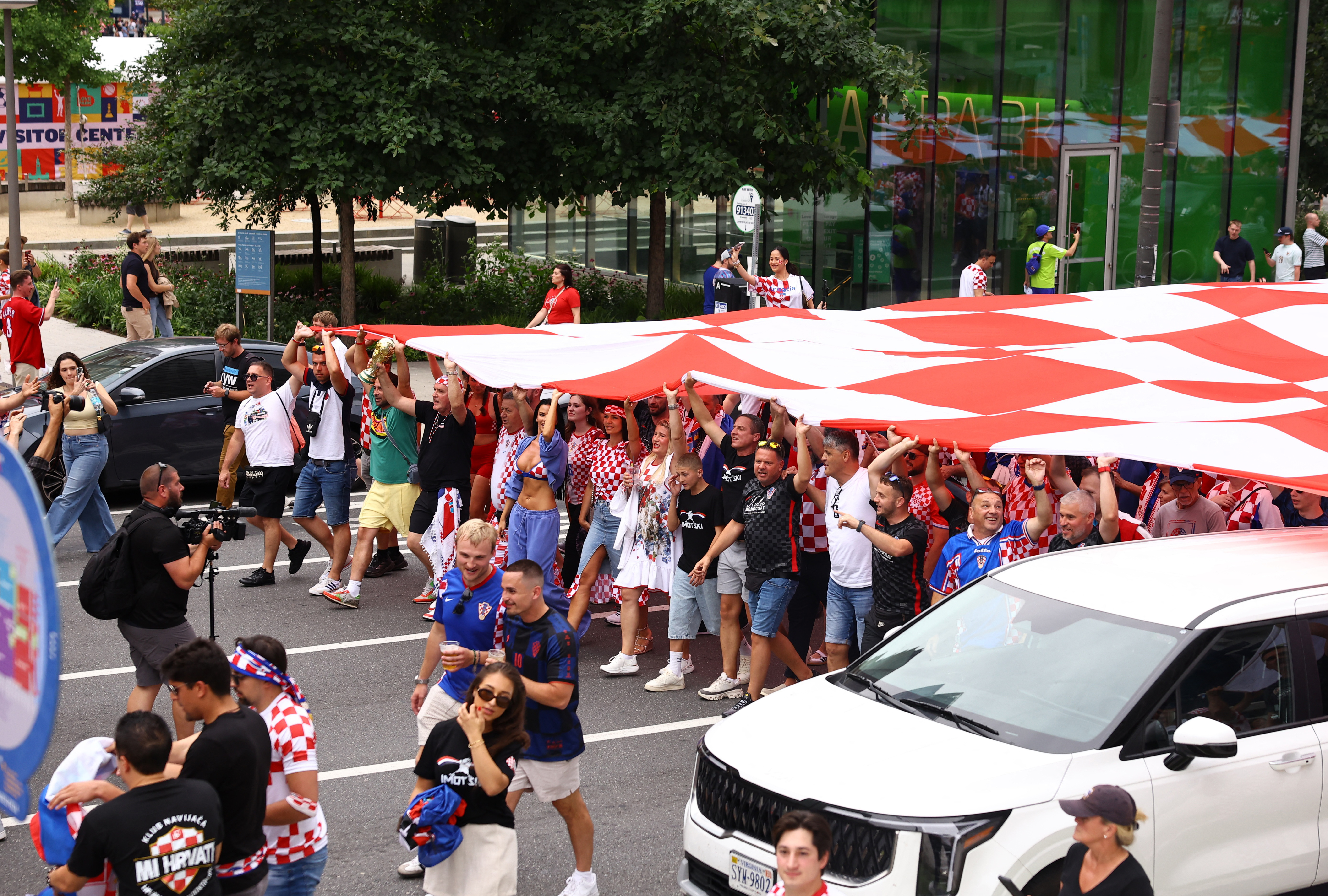Croatia fans march with a giant flag in Philadelphia REUTERS/Peter Cziborra