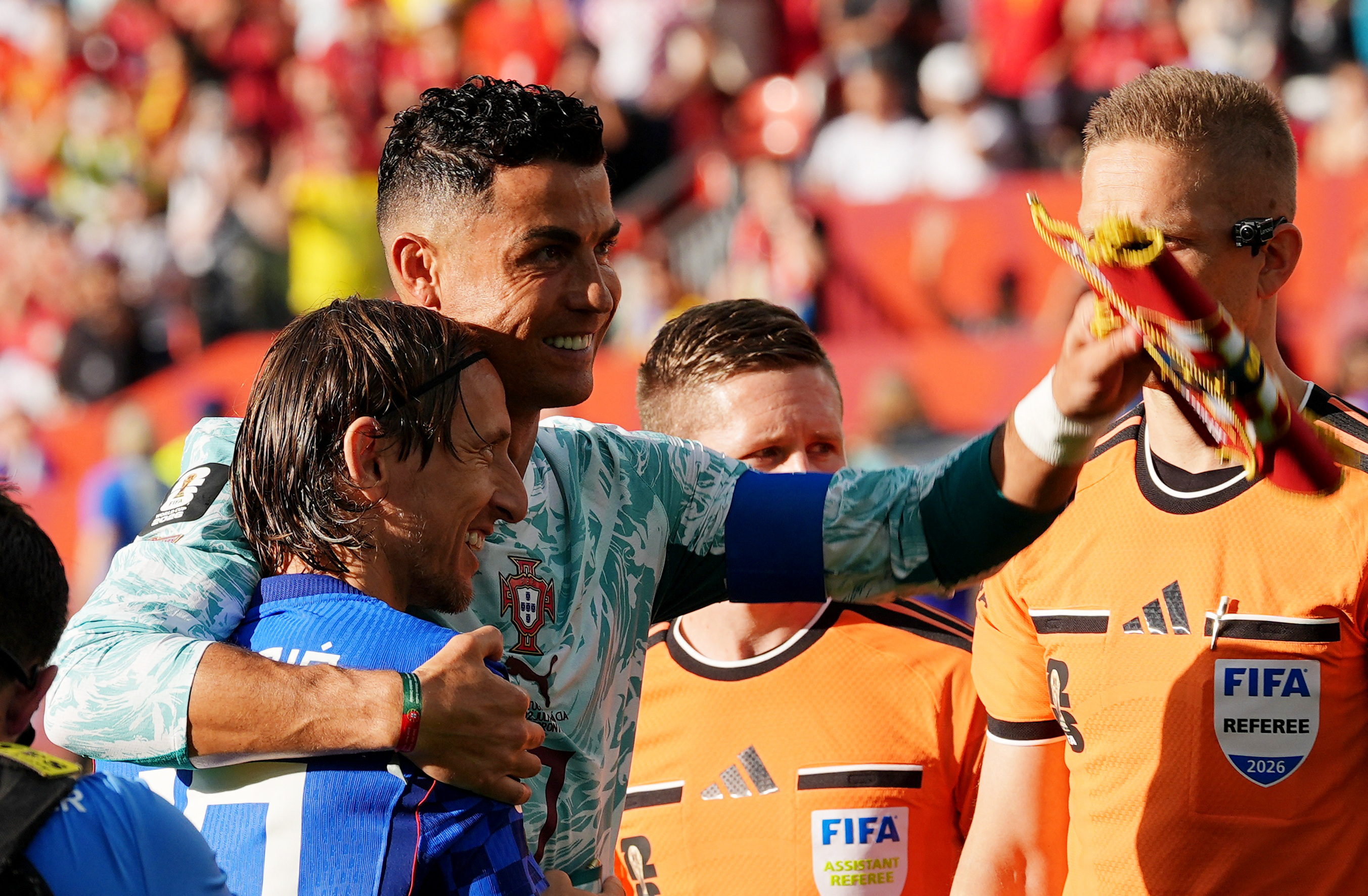 Portugal's Cristiano Ronaldo hugs Croatia's Luka Modric IMAGN IMAGES via Reuters/John E Sokolowski