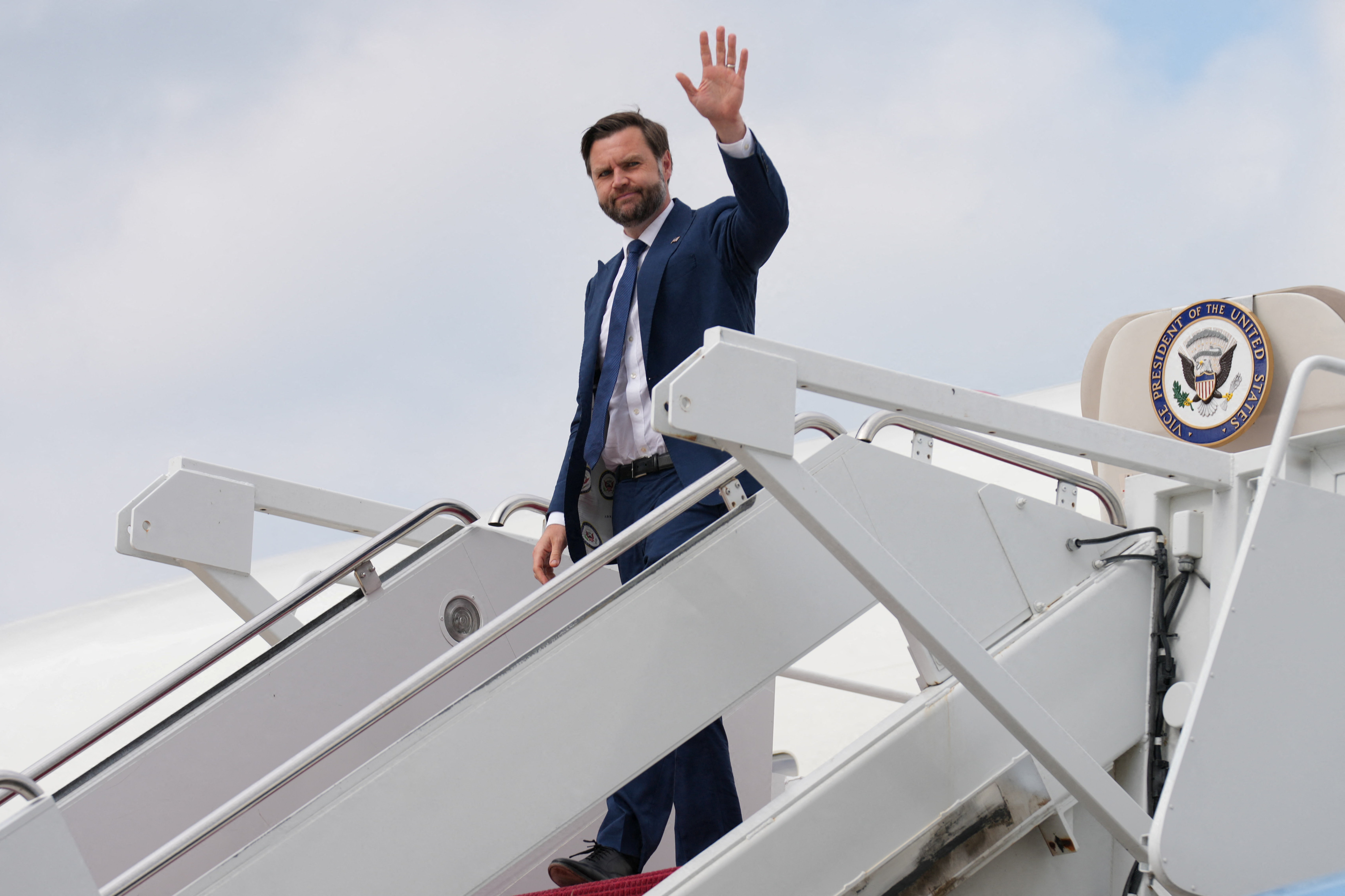 U.S. Vice President JD Vance steps off Air Force Two, at Joint Base Andrews, Maryland, U.S., July 8, 2026.     Mark Schiefelbein/Pool via REUTERS
