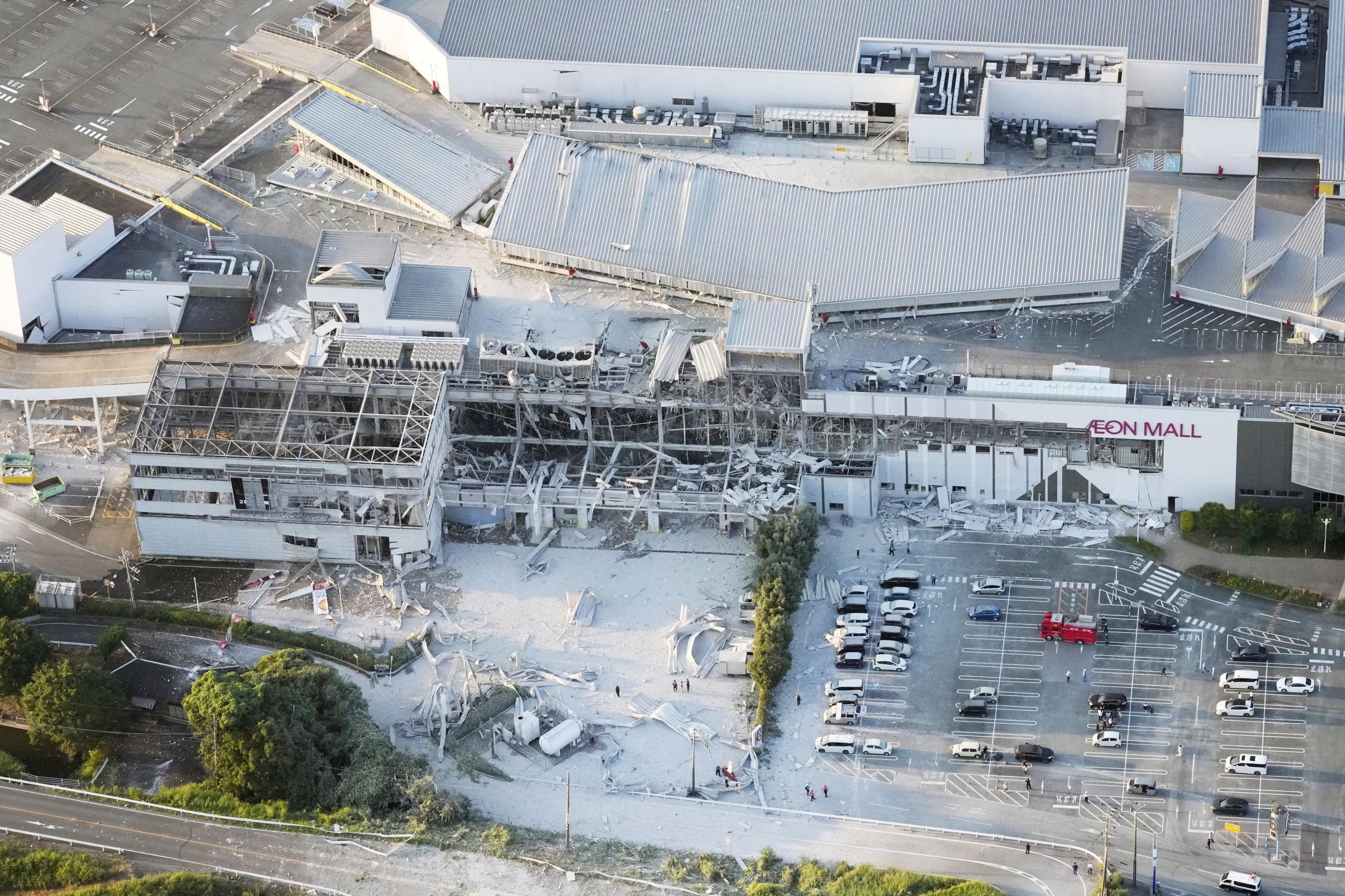 An aerial view shows the damaged Aeon Mall shopping centre. Kyodo/via REUTERS