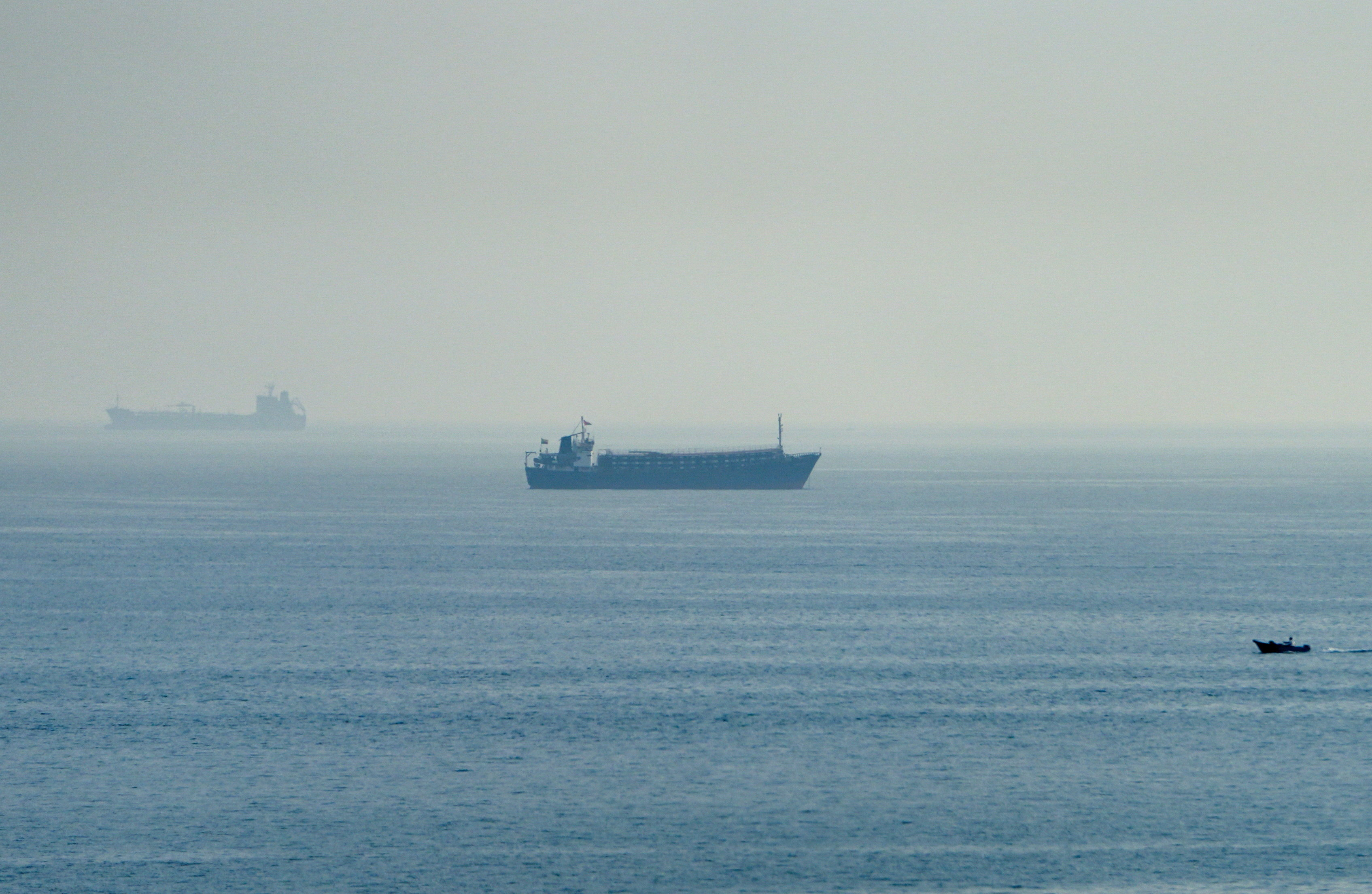 Vessels in the Strait of Hormuz, as seen from Musandam, Oman, July 31, 2026. REUTERS/Stringer