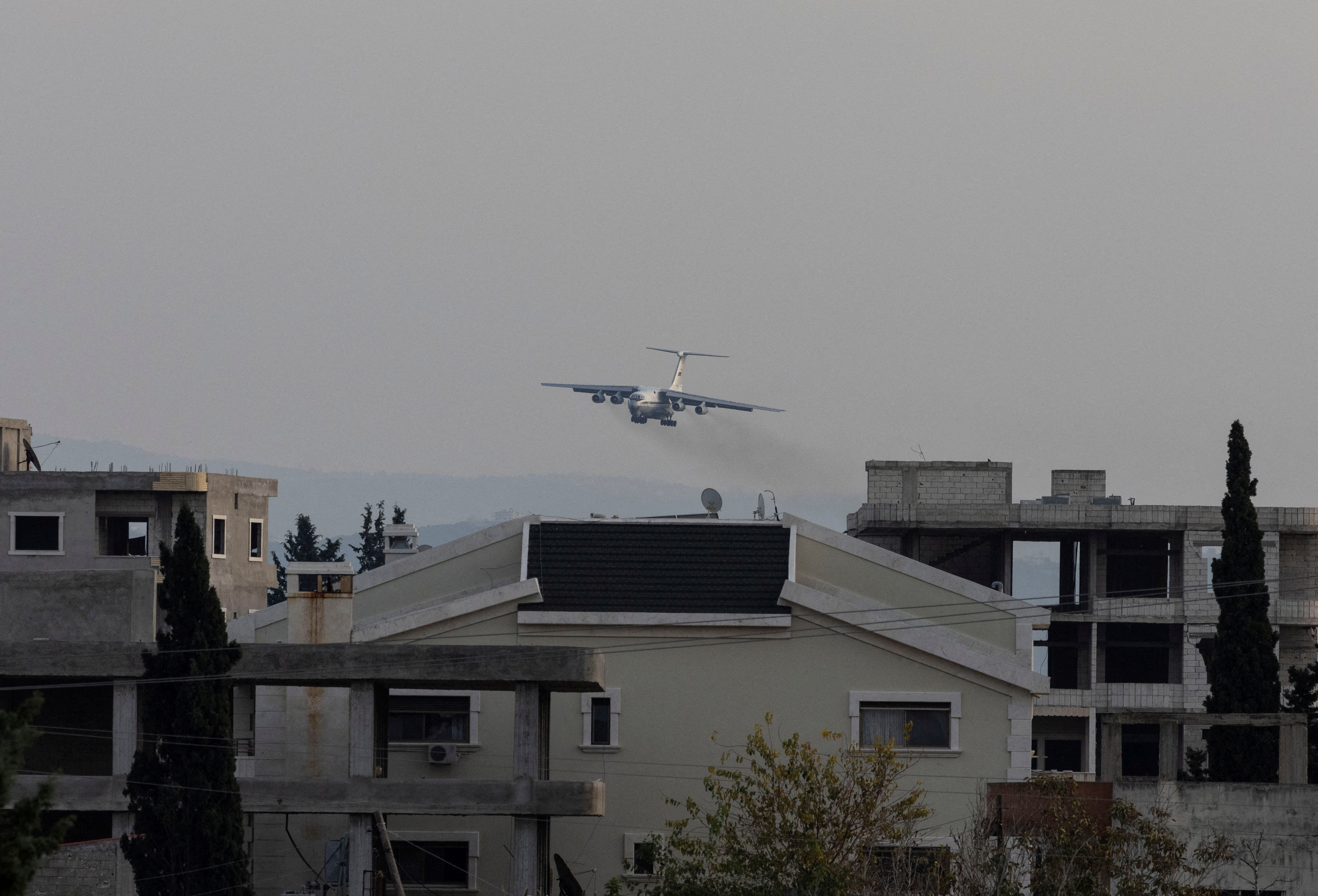 A Russian military aircraft approaches the Hmeimim air base in Syria's coastal Latakia, Syria, December 15, 2024.