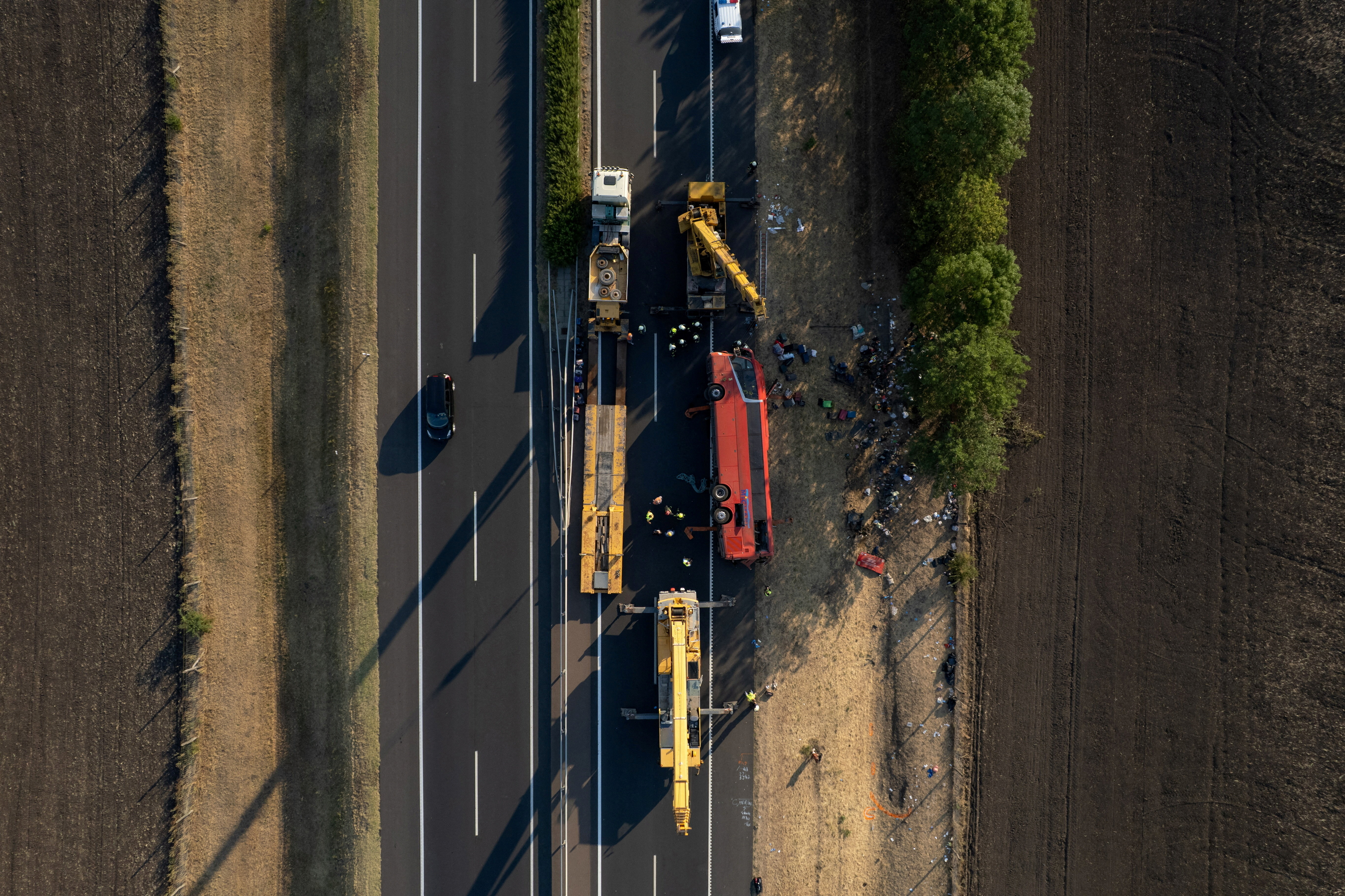 A drone view shows firefighters working on the scene of a deadly accident. MTI/Zoltan Mathe/Pool via REUTERS HUNGARY OUT