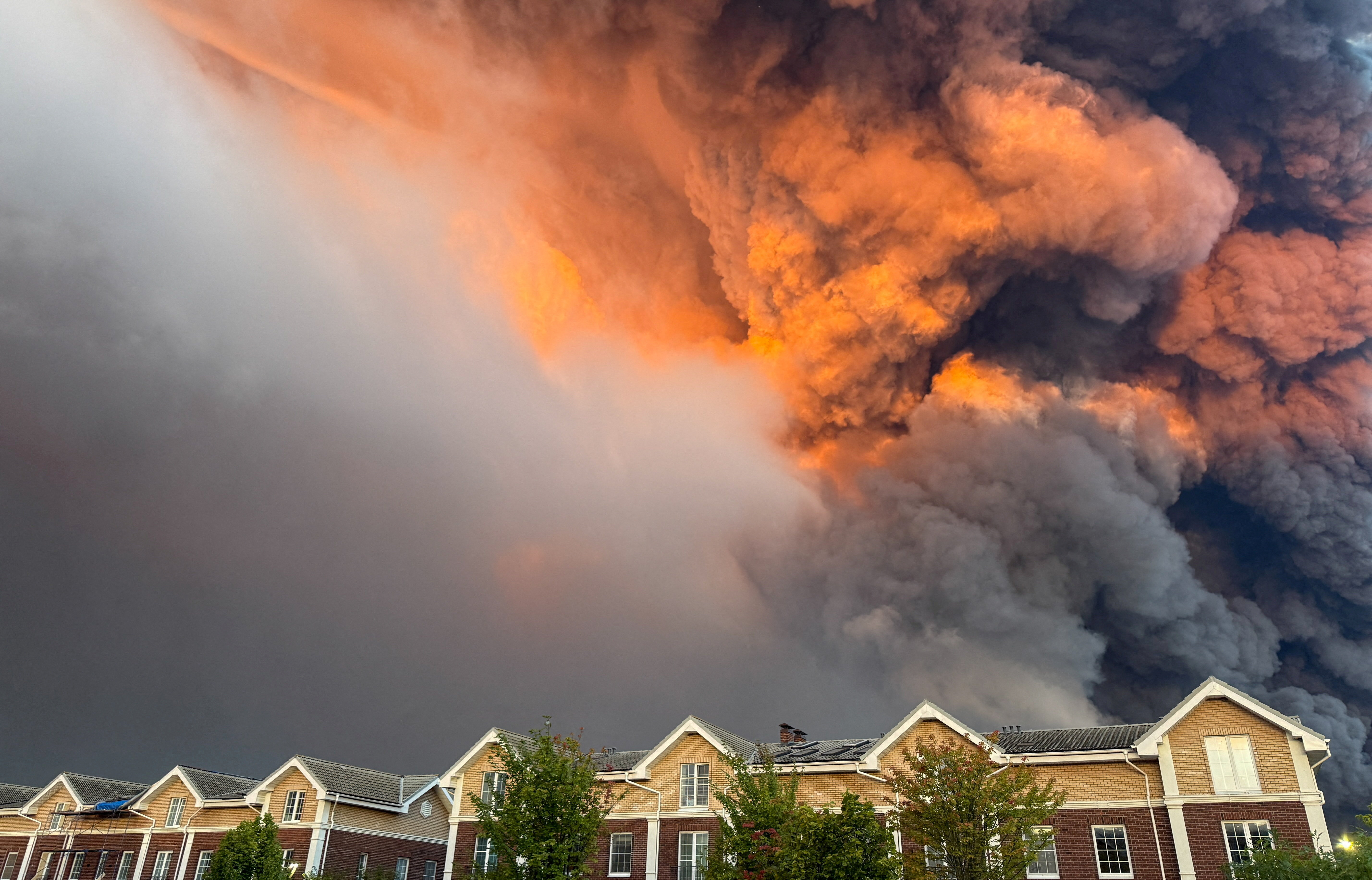 Smoke billows from the burning Wildberries warehouses. REUTERS/Stringer
