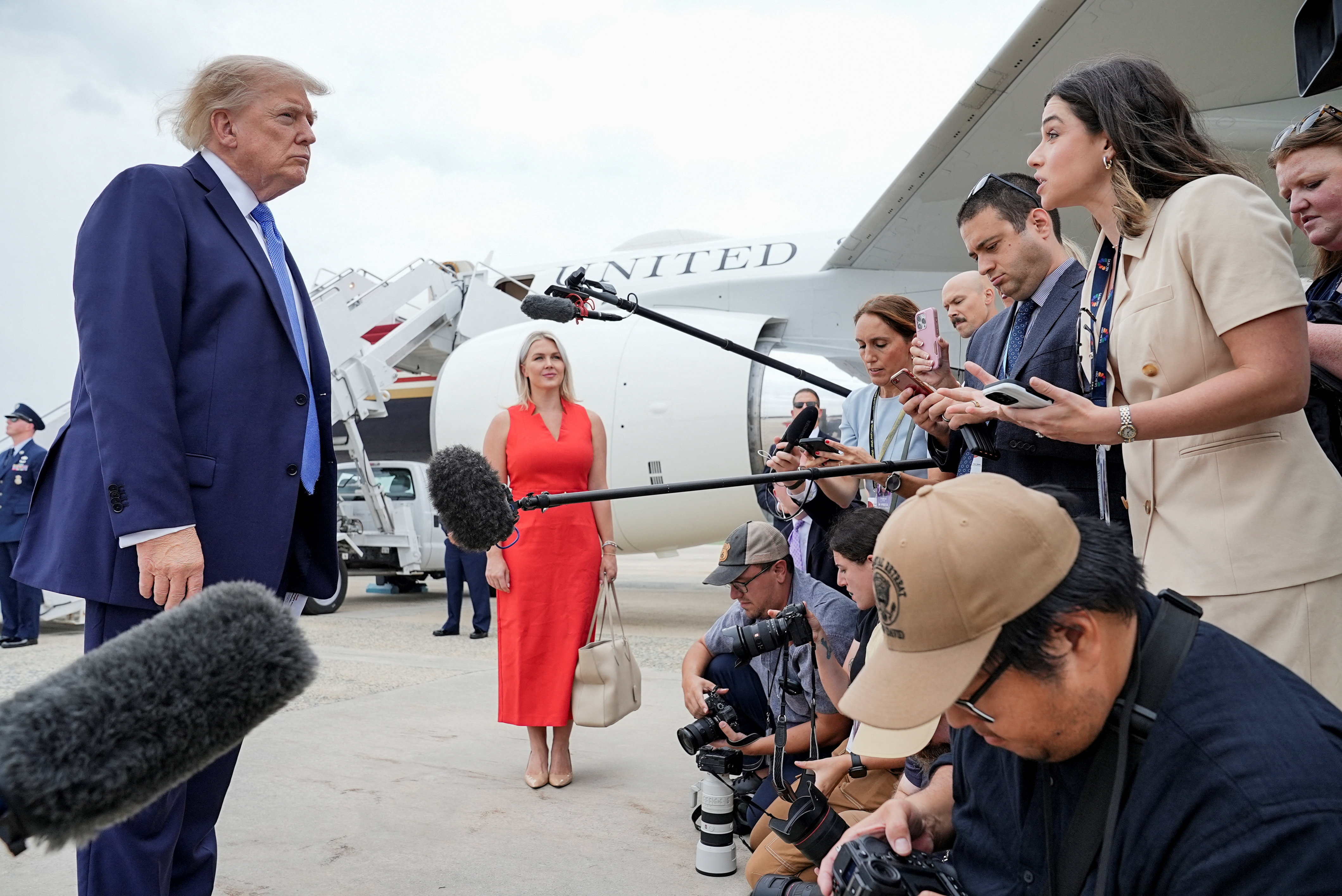 2026-08-14T172456Z_1056658862_RC2HYMACOZGW_RTRMADP_3_USA-TRUMP