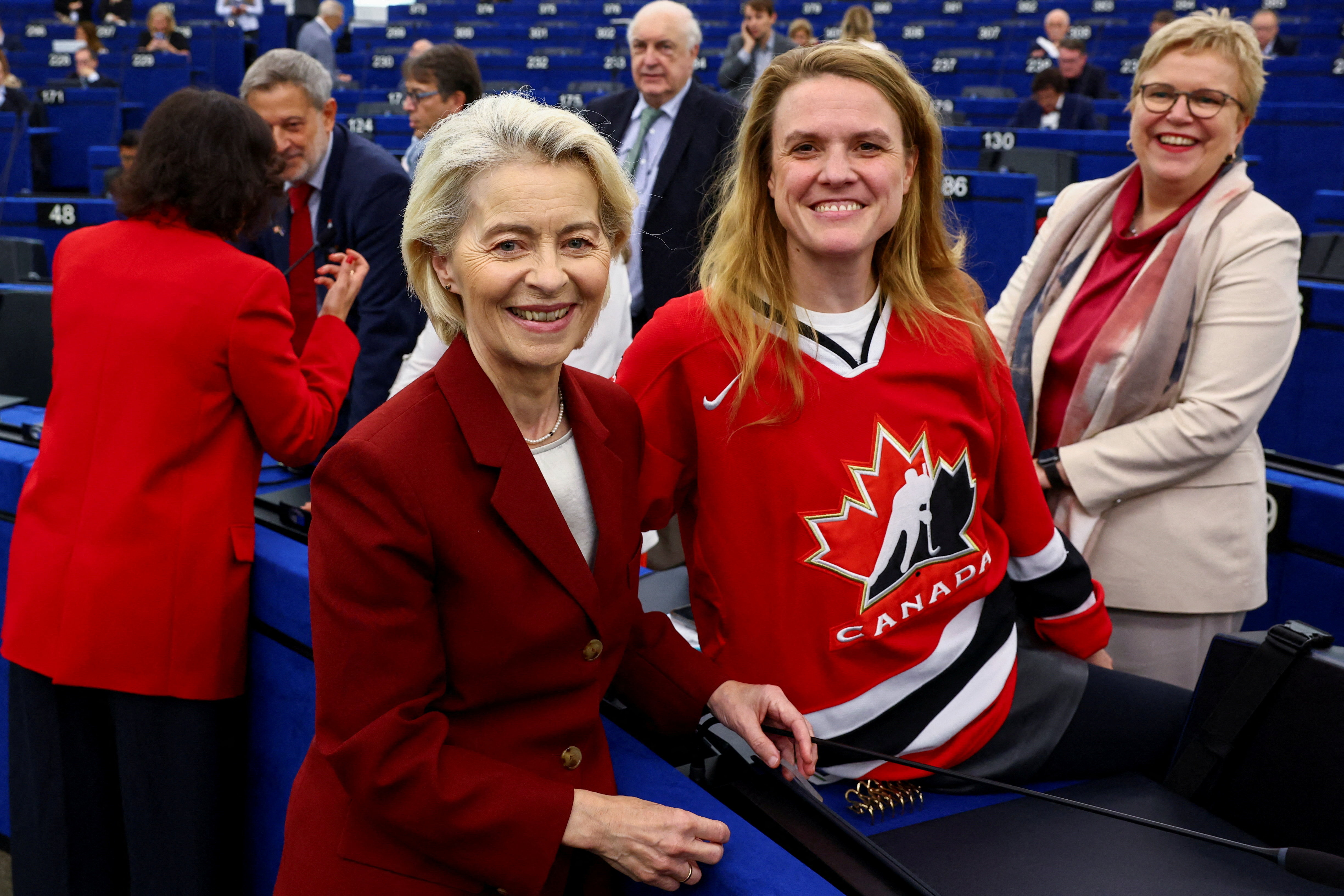 Leader of the Greens–European Free Alliance in the European Parliament Terry Reintke, wearing a Team Canada ice hockey jersey, poses for a picture with European Commission President Ursula von der Leyen, ahead of Canadian Prime Minister Mark Carney
