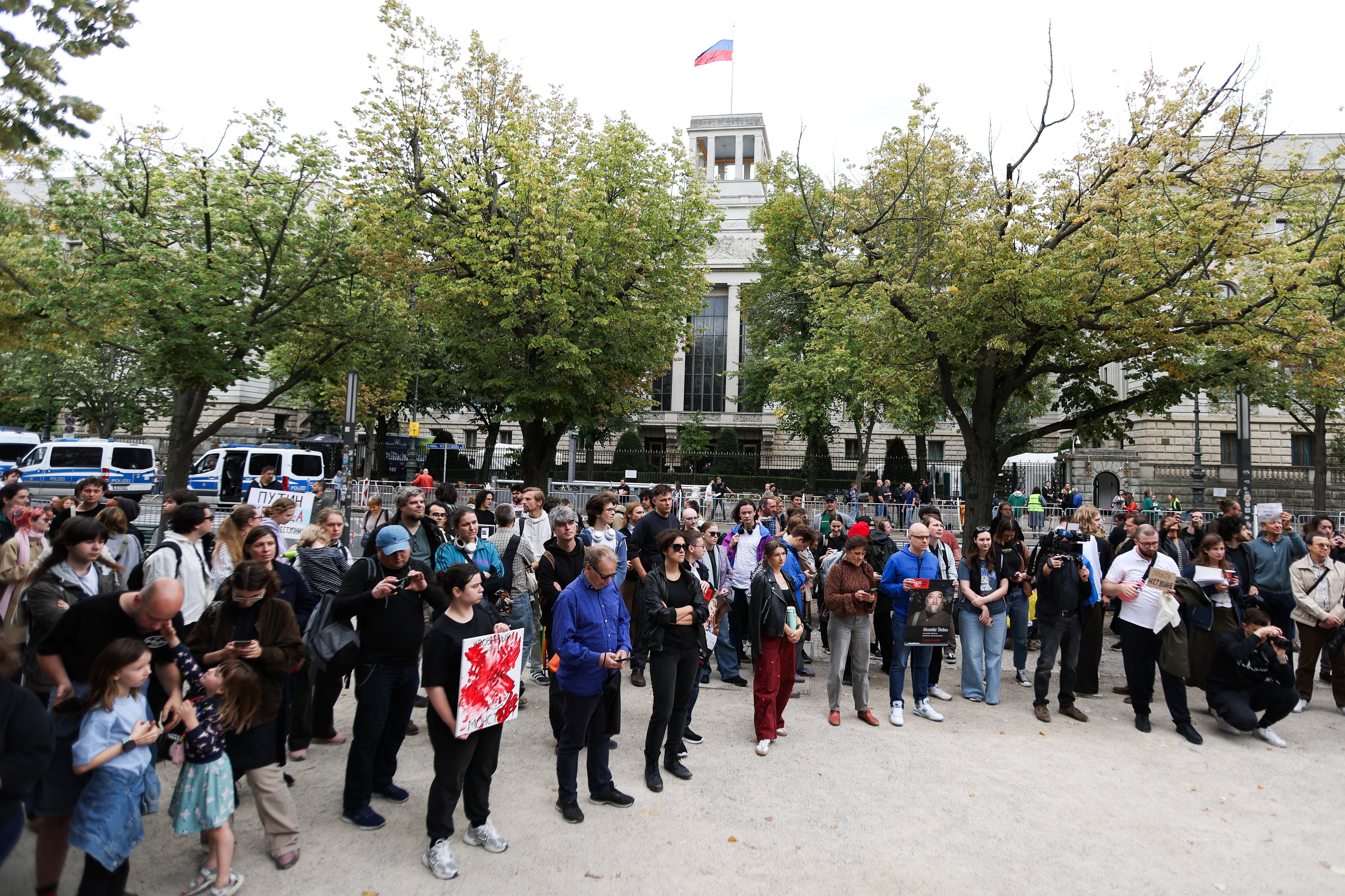 People attend a protest under the motto "Noon against Putin" at the Russian Embassy, in Berlin, Germany, September 20, 2026. REUTERS/Maryam Majd