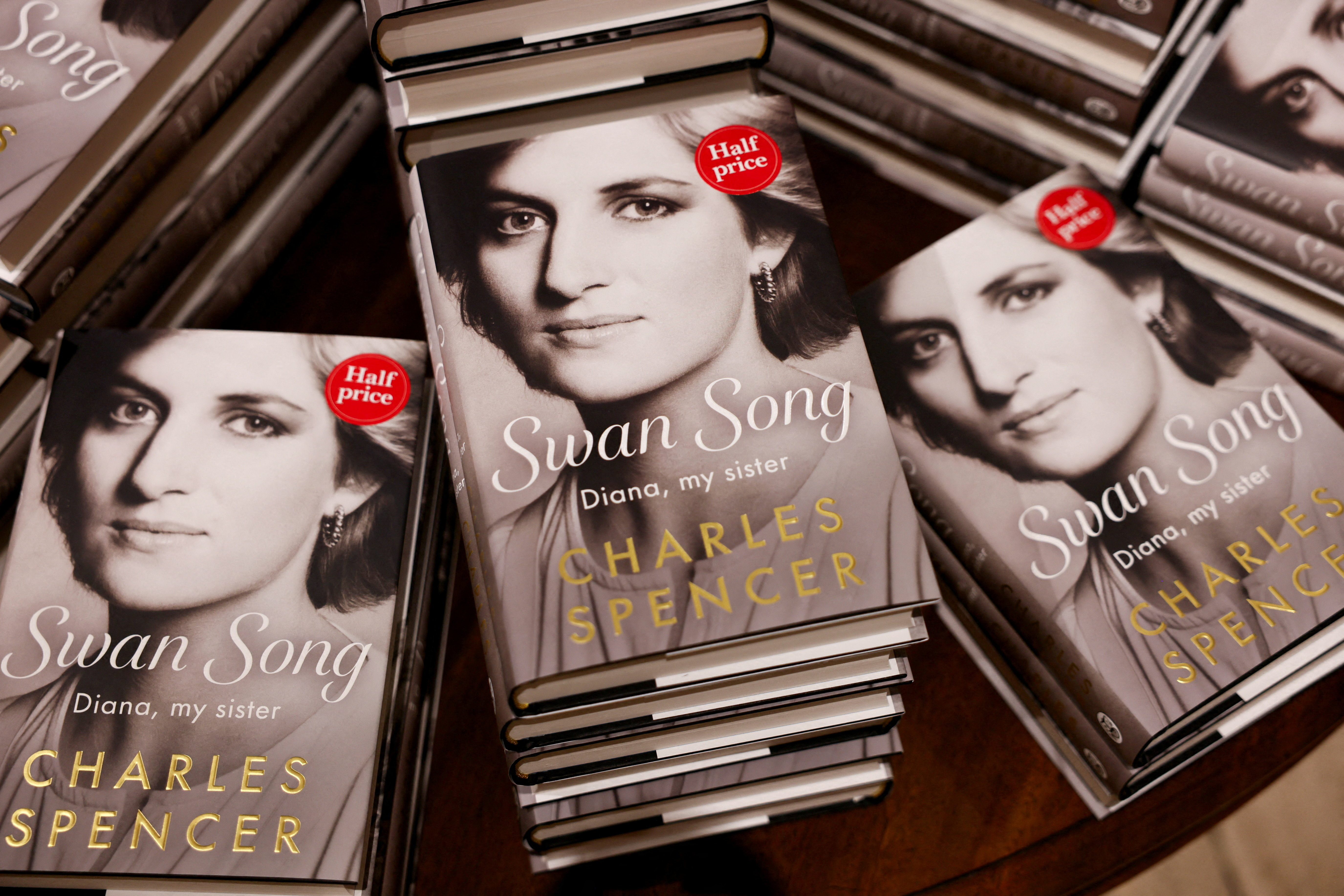 Copies of Princess Diana's brother Charles Spencer's book "Swan Song". REUTERS/Jack Taylor