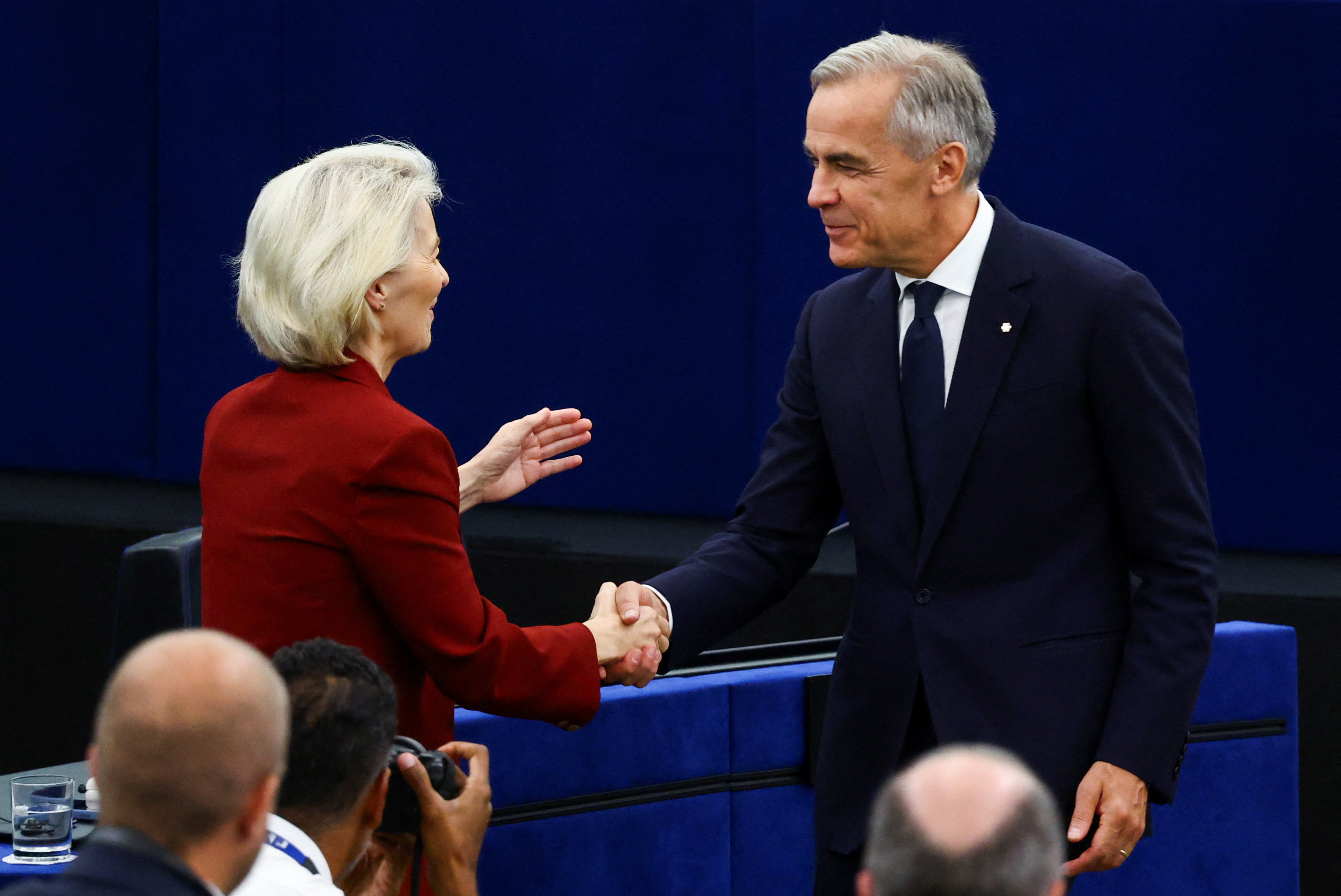 Canadian Prime Minister Mark Carney is congratulated by European Commission President Ursula von der Leyen after his speech at the European Parliament in Strasbourg, France September 17, 2026. REUTERS/Yves Herman
