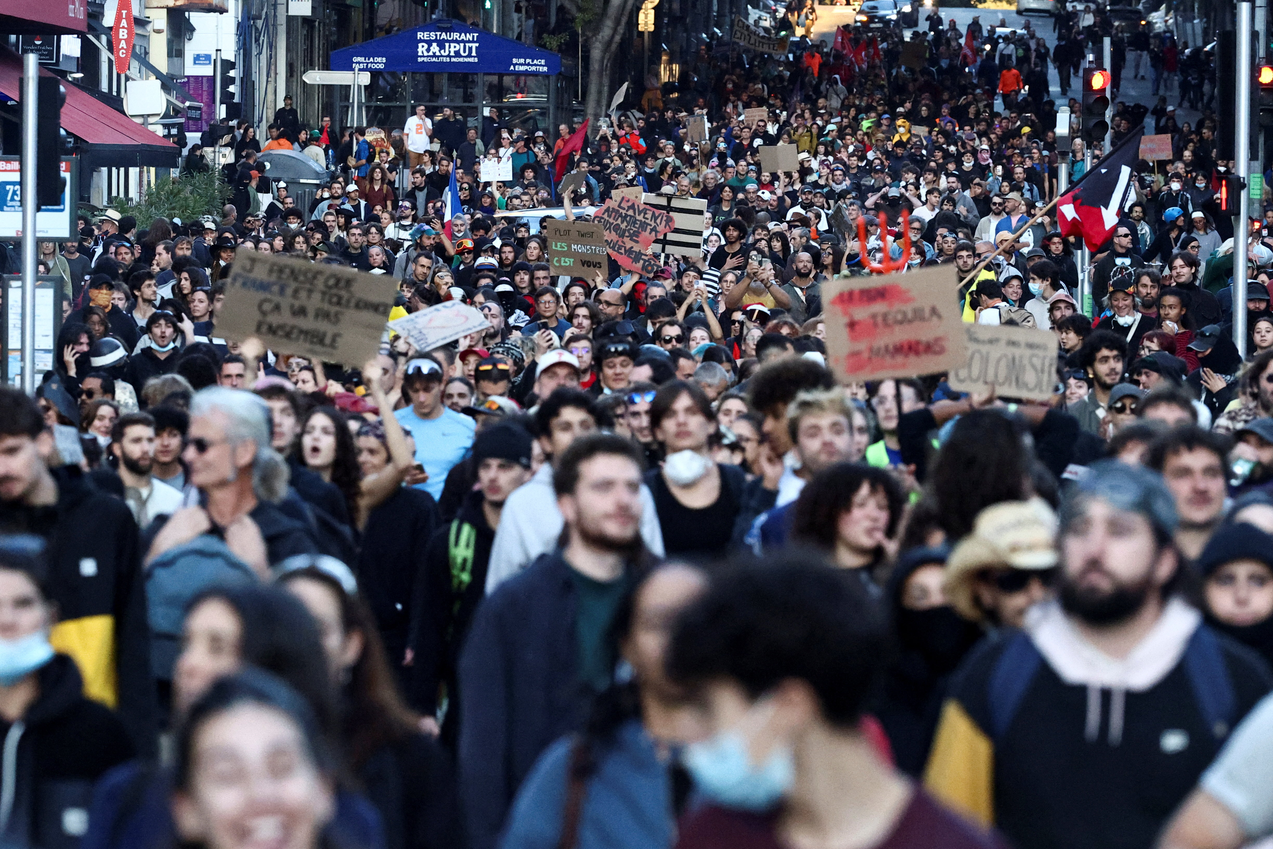 People attend a demonstration. REUTERS/Manon Cruz